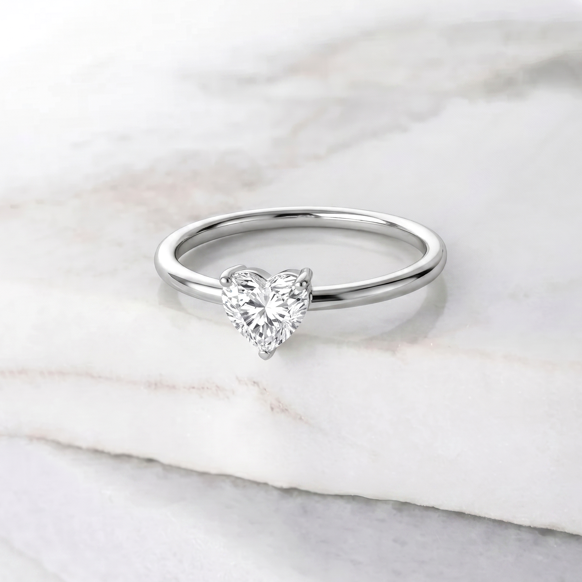 heart solitaire gemstone ring, brilliant moissanite jewelry, minimalist women's accessory, promise jewelry gift, fine gemstone ring, artisan jewelry, polished finish, elegant handcrafted ring, timeless design, luxury fashion jewelry, engagement inspired, refined elegance, sparkling accessory, premium quality, delicate jewelry