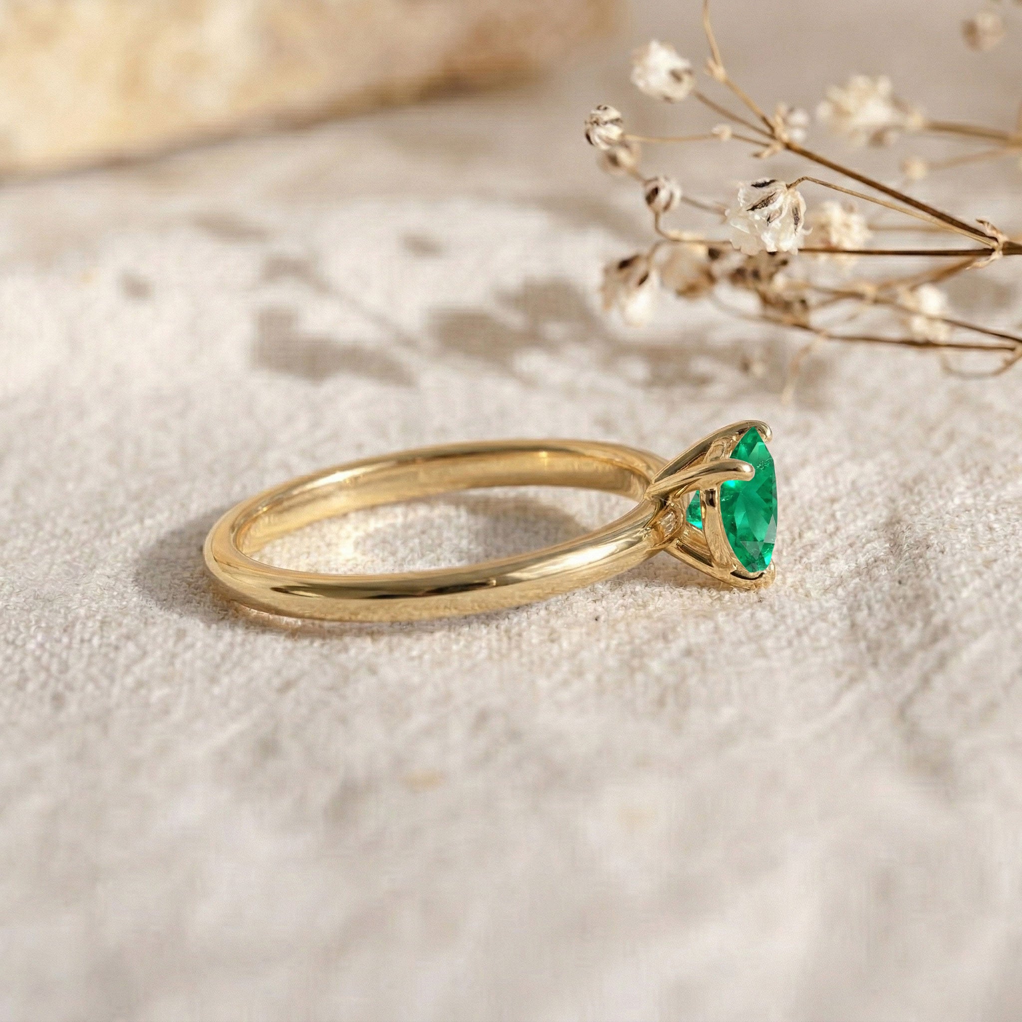 classic emerald solitaire jewelry, green heart gemstone, elegant jewelry gift, promise jewelry, engagement accessory, polished gemstone ring, emerald fashion accessory, may birthstone gift, sophisticated ring design, refined jewelry style, fine emerald ring, romantic fashion, timeless gemstone, women's luxury jewelry, everyday elegance