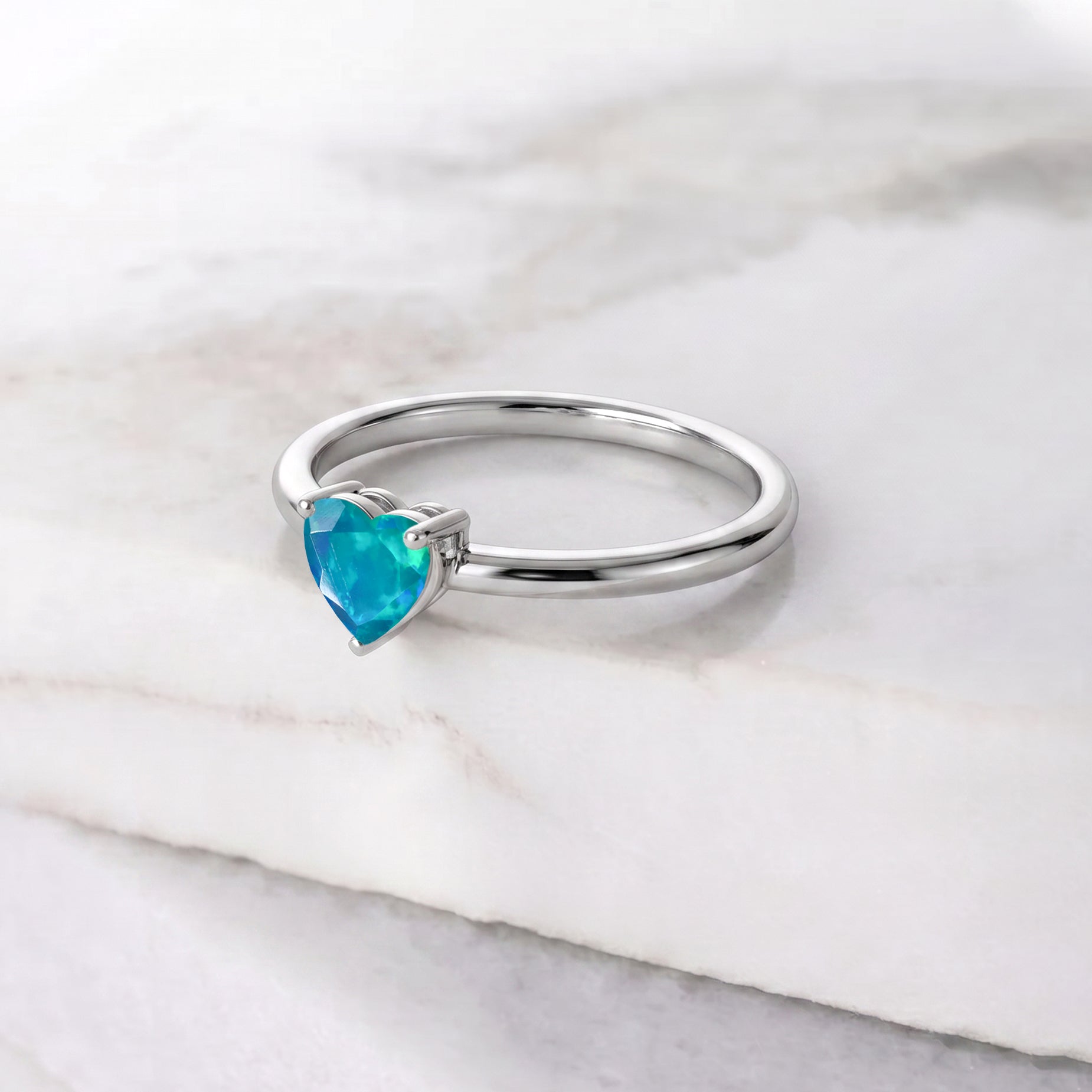 green heart gemstone jewelry, solitaire gemstone elegance, handcrafted ring artistry, polished jewelry design, natural opal sparkle, romantic jewelry collection, classic gemstone accessory, women's heart ring, elegant promise jewelry, sophisticated fashion ring, meaningful birthstone gift, artisan gemstone ring, fine jewelry craftsmanship, graceful solitaire, everyday accessory