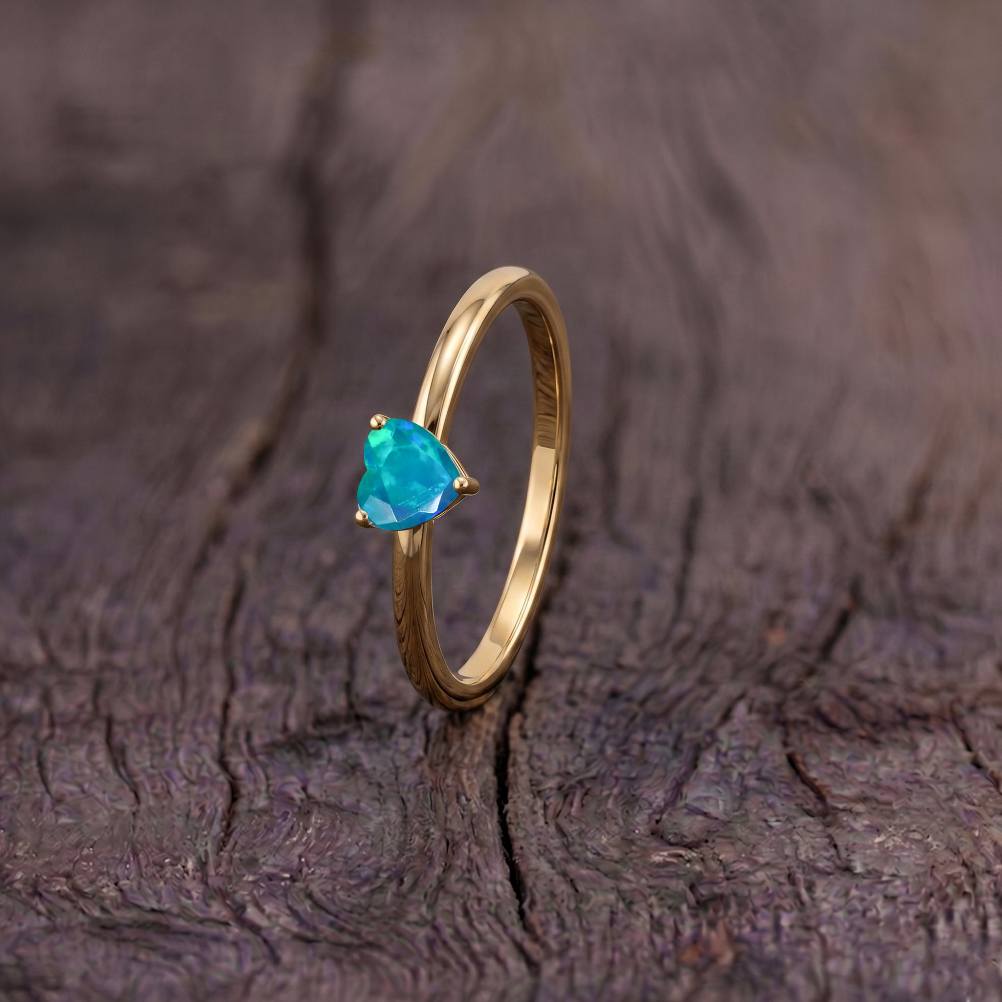 natural green gemstone ring, elegant heart jewelry design, solitaire gemstone centerpiece, handcrafted women's accessory, october birthstone elegance, sparkling opal gemstone, polished classic ring, romantic fine jewelry, anniversary gift idea, birthday jewelry inspiration, minimalist gemstone style, refined heart jewelry, premium gemstone ring, timeless fashion accessory, delicate luxury