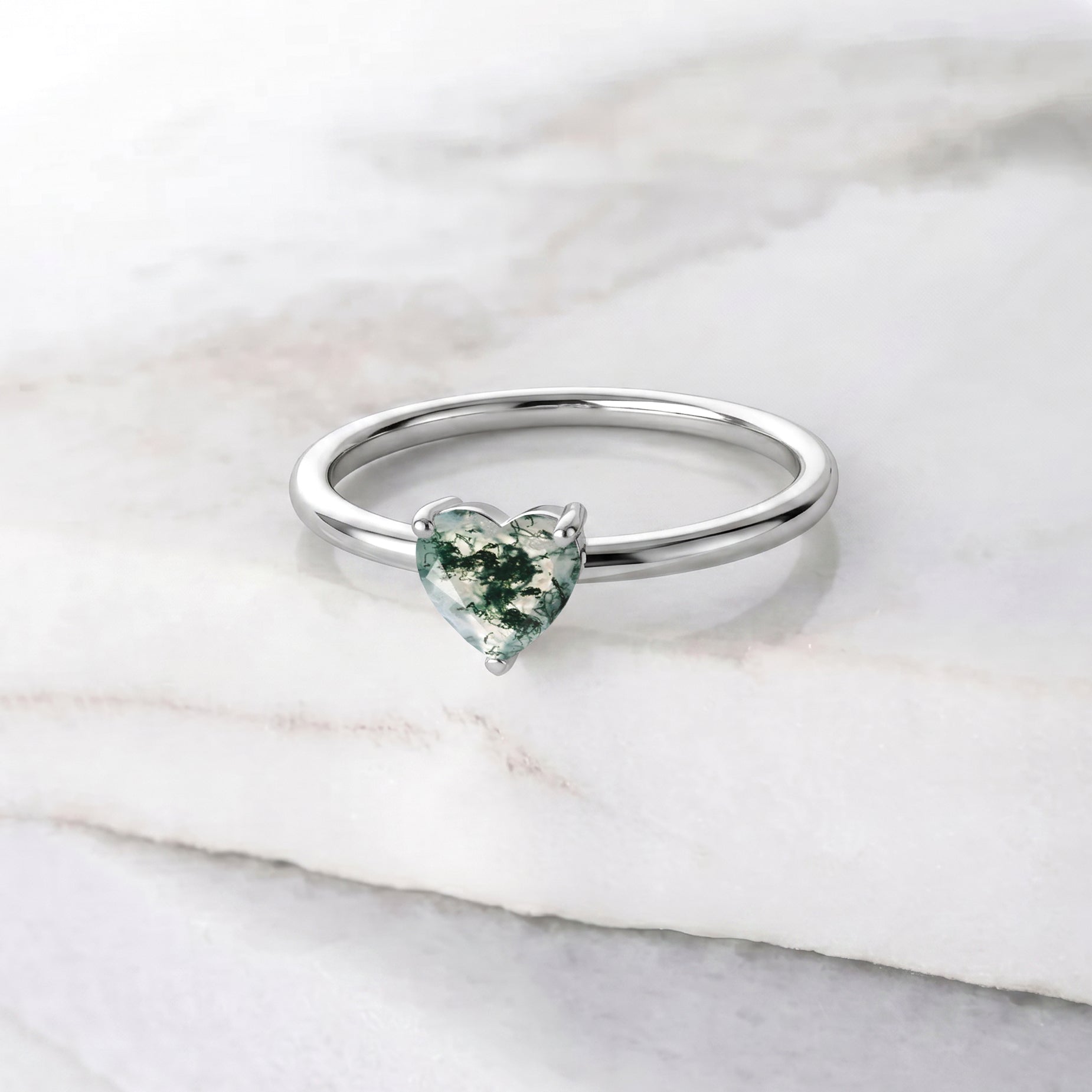 heart moss agate gemstone, natural botanical inclusions, elegant solitaire ring, women promise jewelry, artisan gemstone accessory, unique heart jewelry, minimalist luxury ring, timeless gemstone style, handcrafted fine jewelry, romantic gift ring, sophisticated gemstone design, nature jewelry