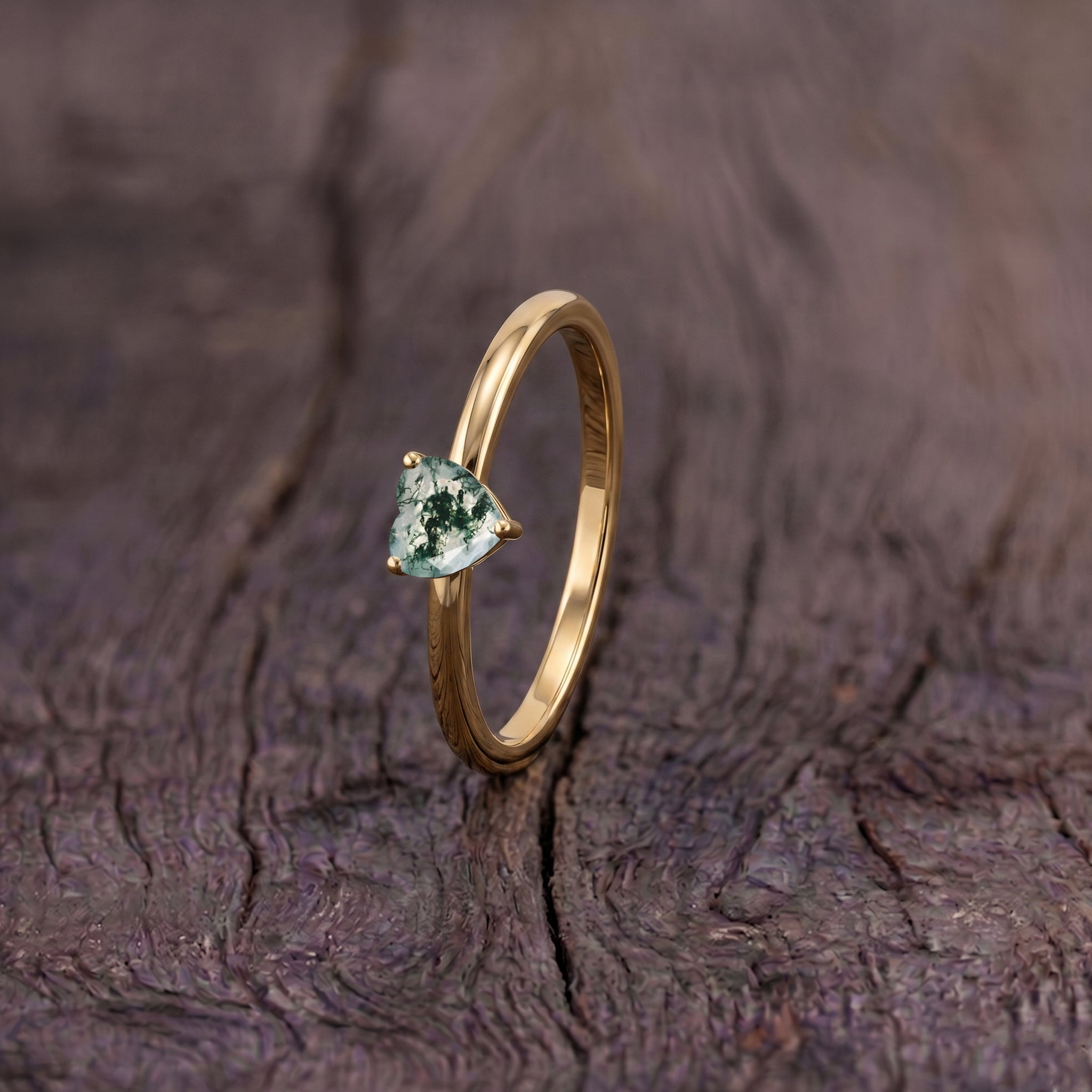natural botanical gemstone ring, moss agate heart jewelry, solitaire gemstone fashion, elegant minimalist accessory, women engagement jewelry, timeless heart design, handcrafted gemstone piece, romantic promise jewelry, unique gemstone artistry, luxury fine jewelry, organic gemstone appearance, stylish ring