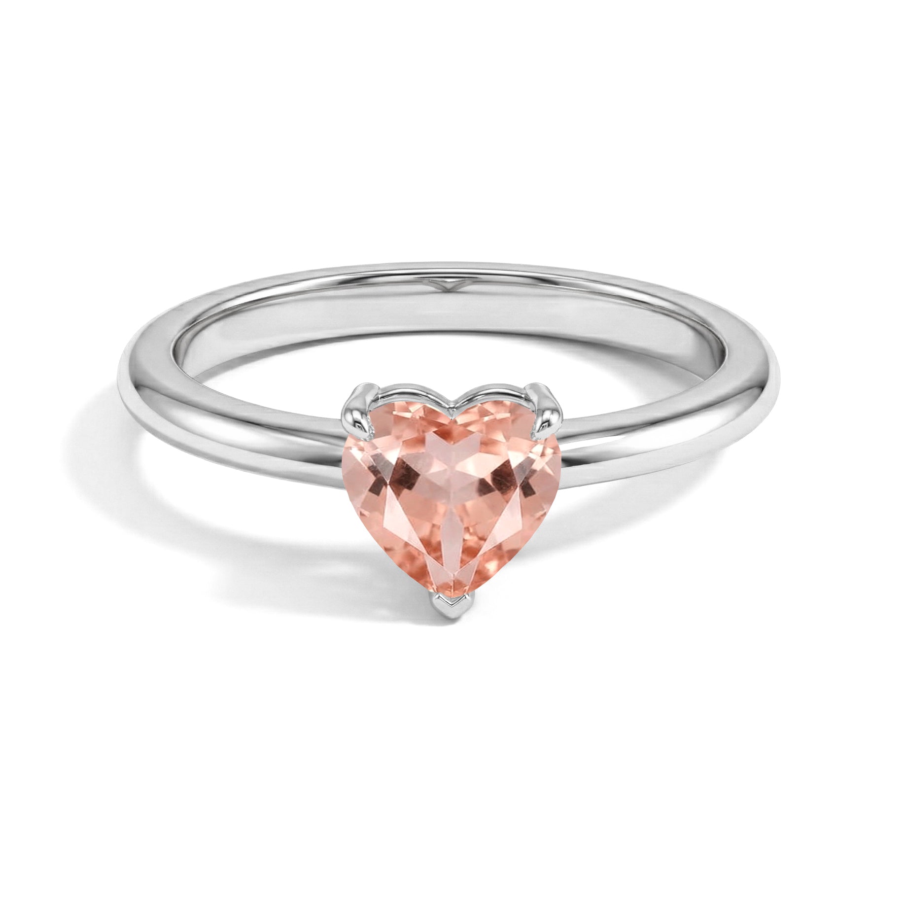 morganite heart ring, heart cut gemstone jewelry, solitaire fashion ring, elegant women's jewelry, contemporary jewelry design, refined gemstone accessory, handmade ring, everyday luxury jewelry, anniversary gift, promise jewelry, fine jewelry collection, romantic keepsake, timeless style, premium craftsmanship, jewelry for women