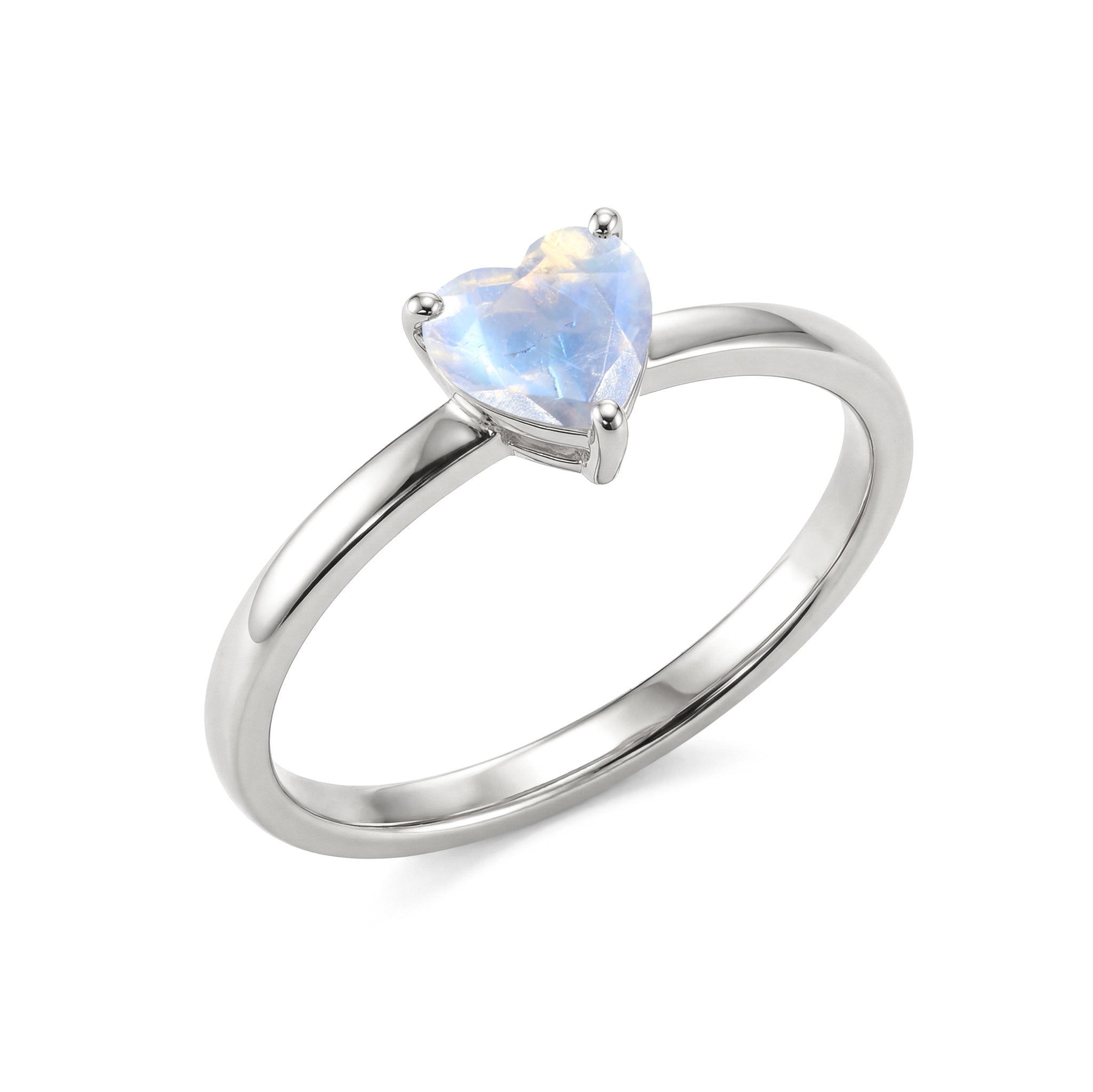 natural moonstone ring details, heart shaped gemstone jewelry, solitaire gemstone style, handcrafted women's accessory, meaningful gemstone ring, classic elegant jewelry, artisan jewelry craftsmanship, birthday gift inspiration, anniversary keepsake, fine jewelry collection, timeless accessory, romantic heart design, gemstone elegance, polished ring, everyday wear