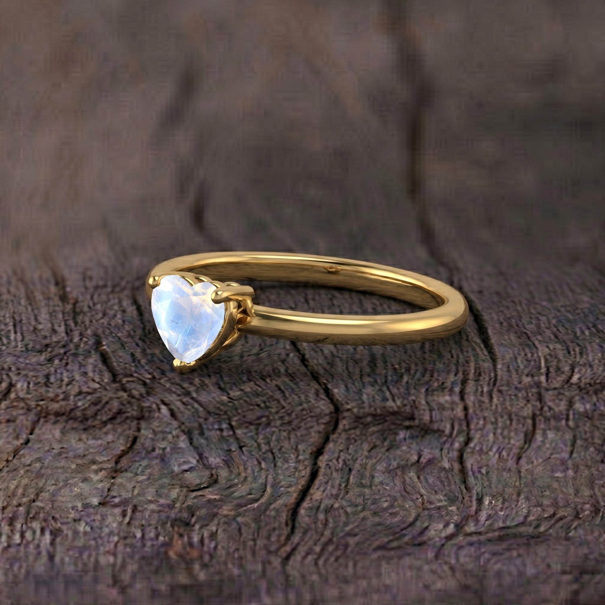moonstone heart jewelry, natural gemstone solitaire, handcrafted artisan ring, refined women's jewelry, gemstone fashion accessory, elegant everyday ring, promise ring gift, anniversary jewelry, birthday keepsake, timeless jewelry collection, fine gemstone craftsmanship, classic ring design, romantic heart jewelry, minimalist elegance, gemstone beauty