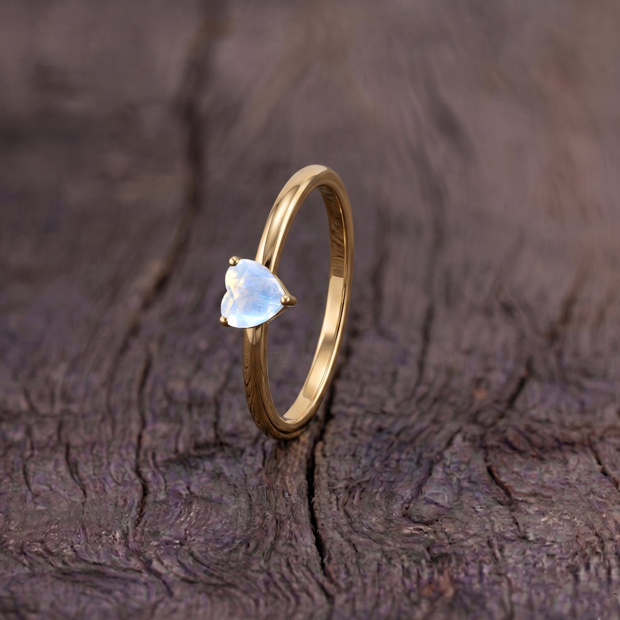 natural moonstone gemstone, heart jewelry ring, elegant handcrafted design, solitaire women's accessory, premium gemstone craftsmanship, birthday jewelry inspiration, anniversary keepsake, promise ring jewelry, refined elegance, classic fashion jewelry, artisan gemstone ring, timeless style, romantic gift, minimalist jewelry, fine accessory