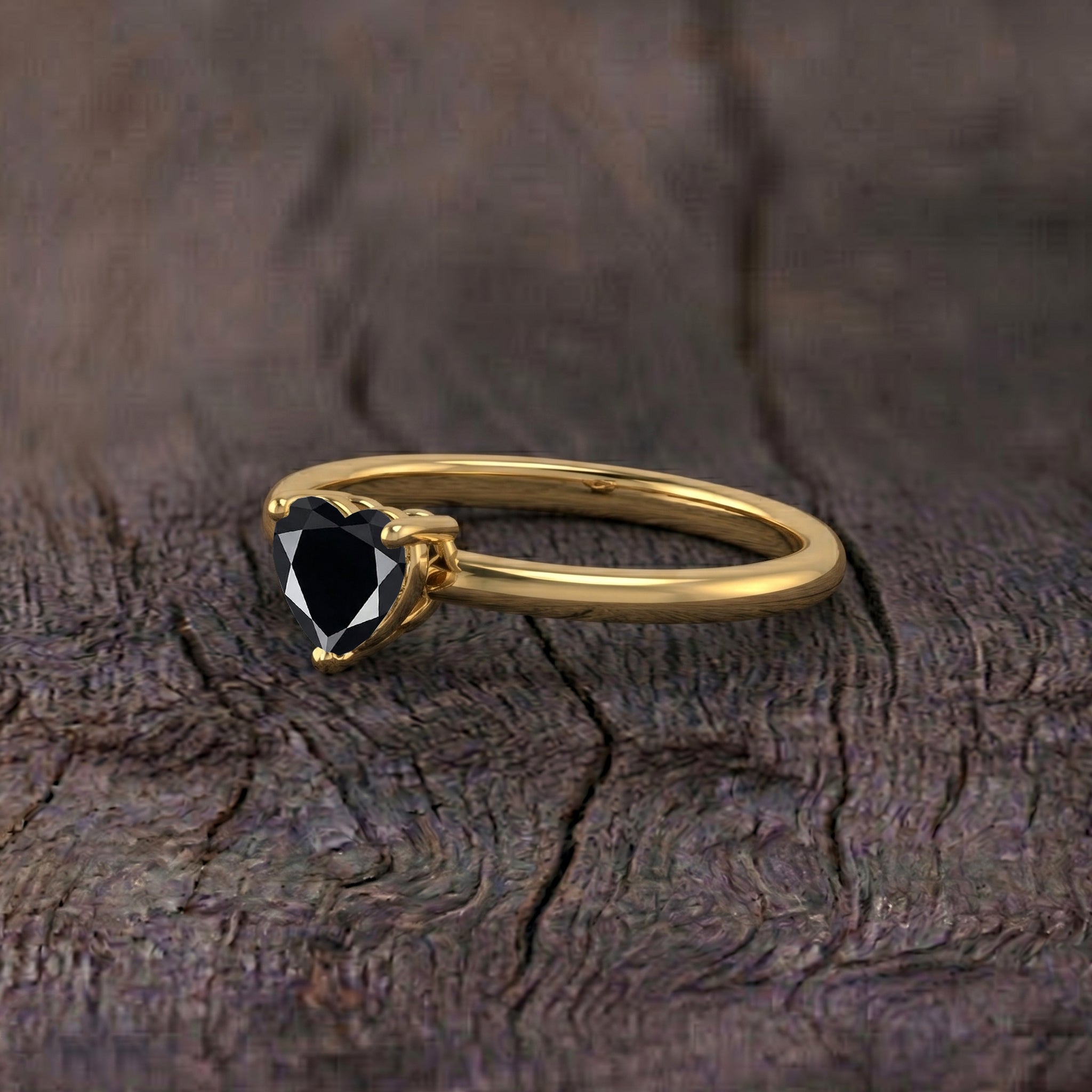 natural black gemstone heart ring, elegant solitaire jewelry, handcrafted gemstone accessory, women's fine jewelry, black heart gemstone, minimalist jewelry gift, fashion gemstone ring, classic promise jewelry, anniversary accessory, timeless jewelry style, artisan craftsmanship, everyday wear jewelry, refined jewelry, romantic heart design, gemstone ring