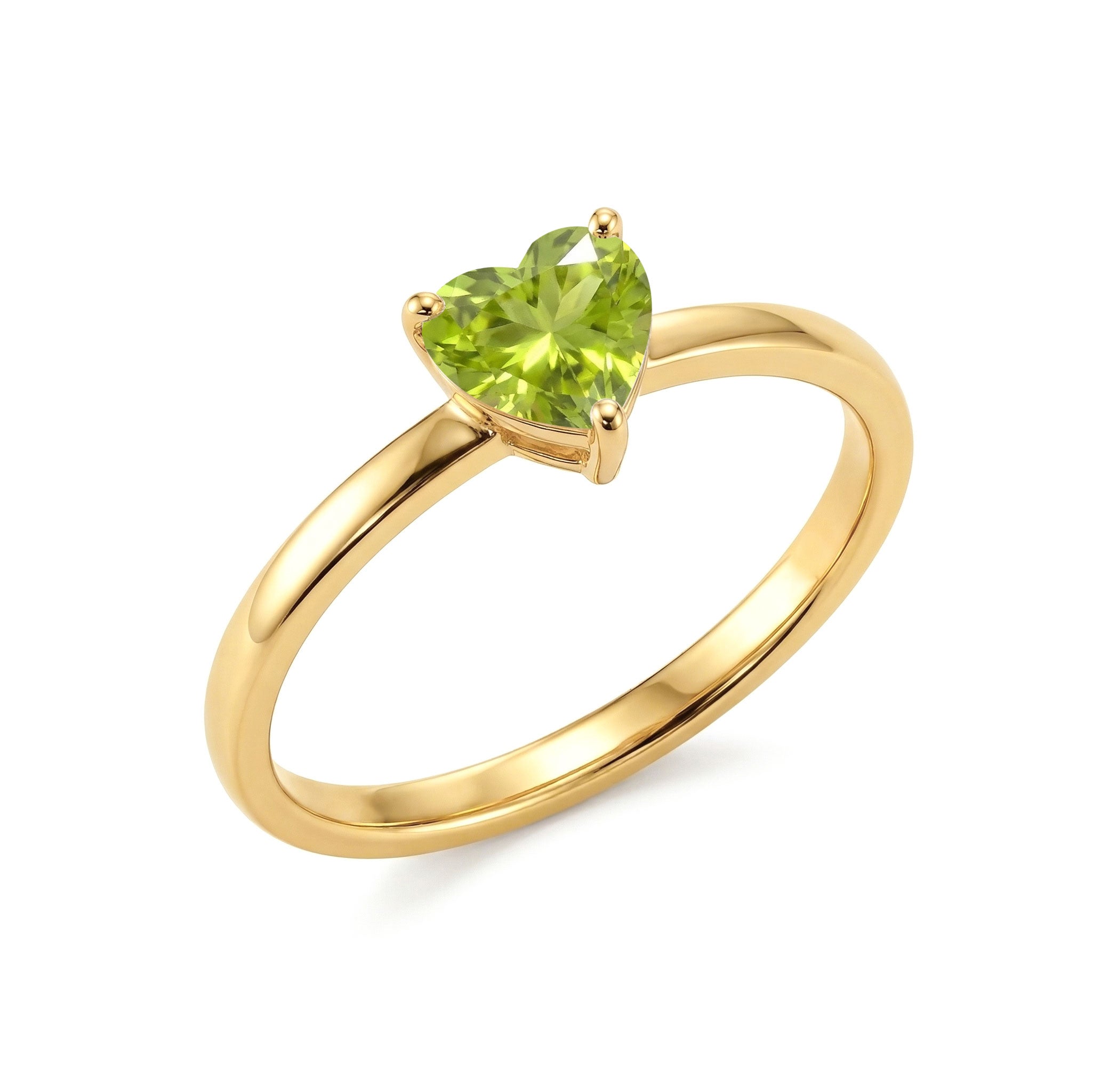 natural august birthstone ring, peridot heart solitaire, polished jewelry band, elegant gemstone fashion, minimalist heart accessory, green gemstone sparkle, promise jewelry ring, timeless women's jewelry, luxury stacking ring, delicate gift jewelry, everyday sophistication