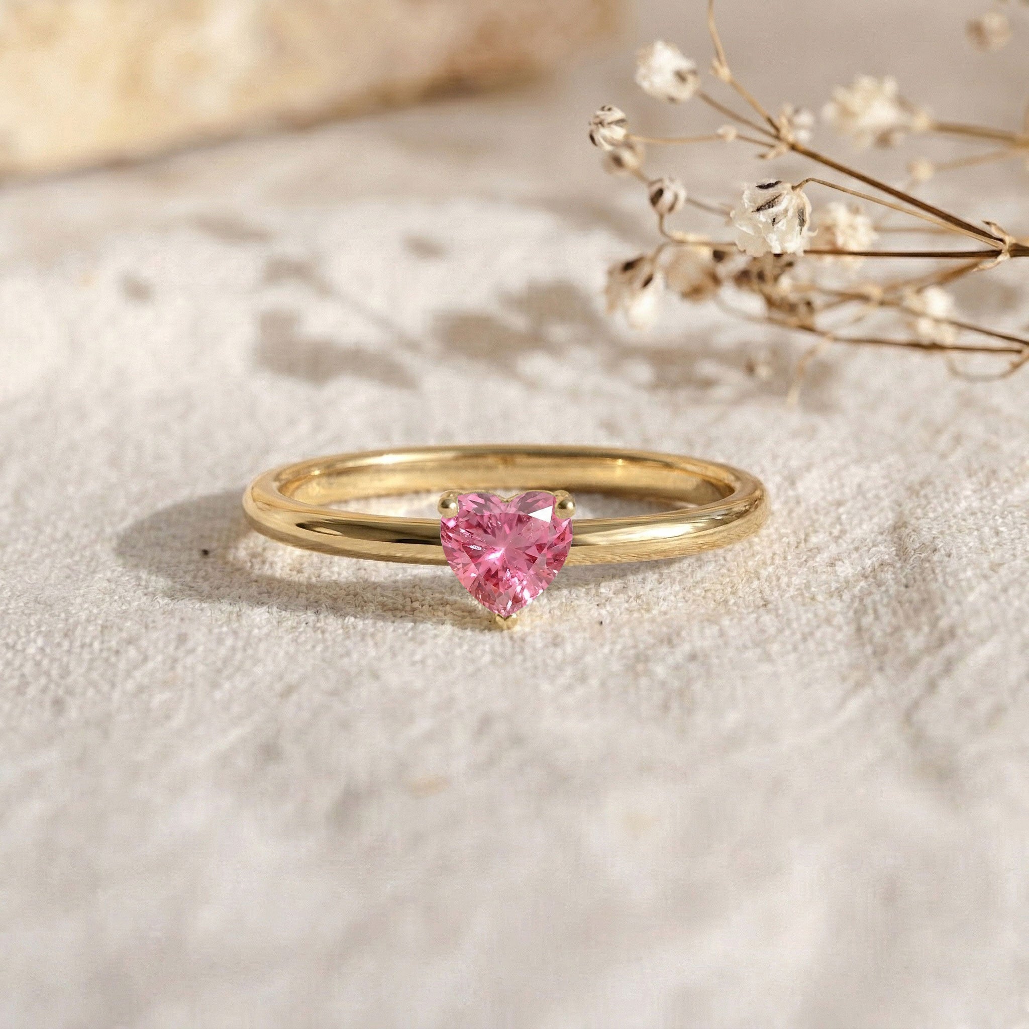pink gemstone heart jewelry, heart solitaire design, artisan handcrafted ring, polished silver jewelry, yellow gold filled finish, minimalist fashion ring, women's gemstone jewelry, romantic keepsake, elegant statement ring, contemporary jewelry, promise gift, fine handcrafted accessory, luxury style, timeless ring, delicate jewelry