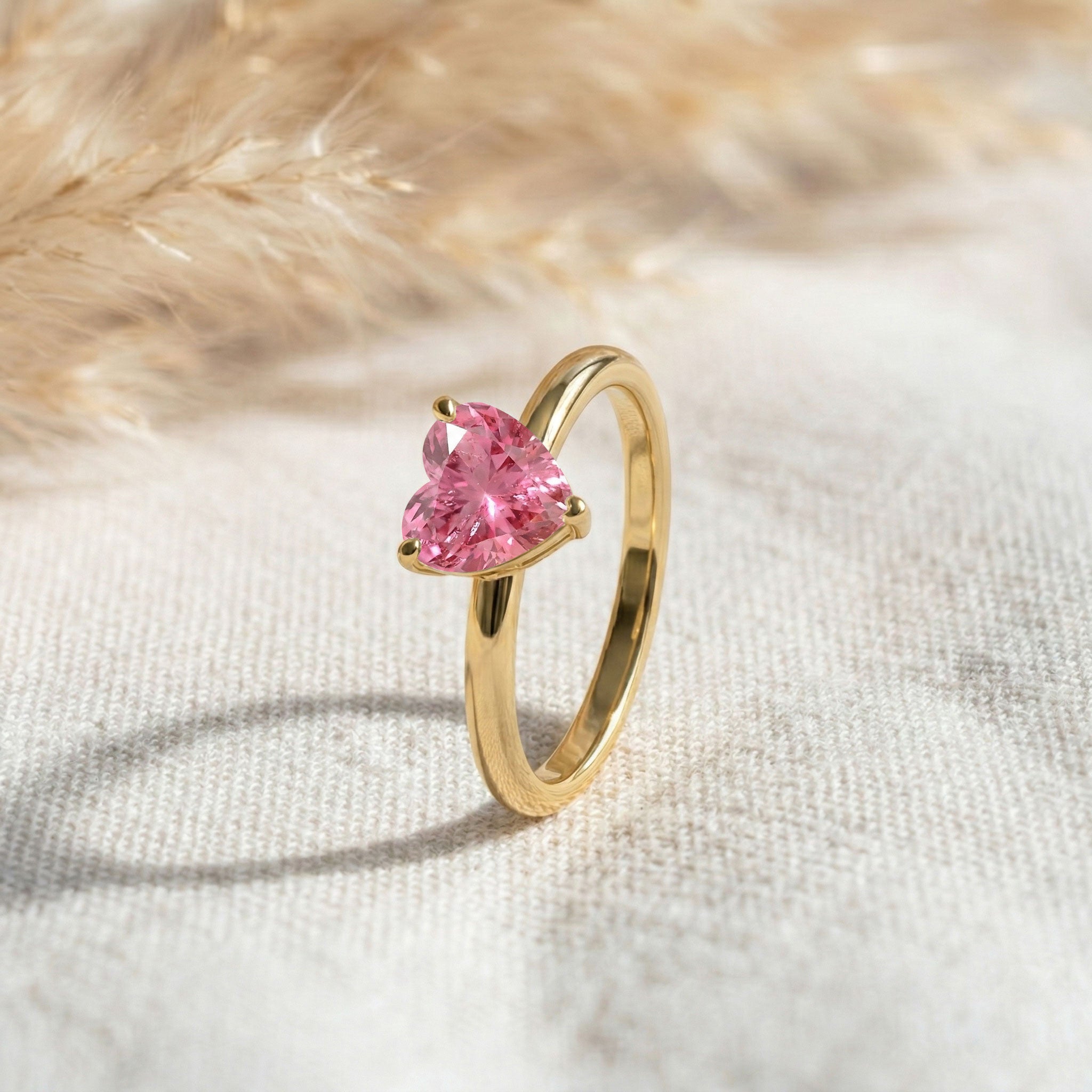 heart solitaire jewelry, pink gemstone ring, handcrafted silver jewelry, gold filled ring option, elegant fashion accessory, polished band, women's luxury jewelry, artisan gemstone design, romantic keepsake, anniversary present, fine handcrafted ring, contemporary style, minimalist elegance, gemstone fashion, premium jewelry