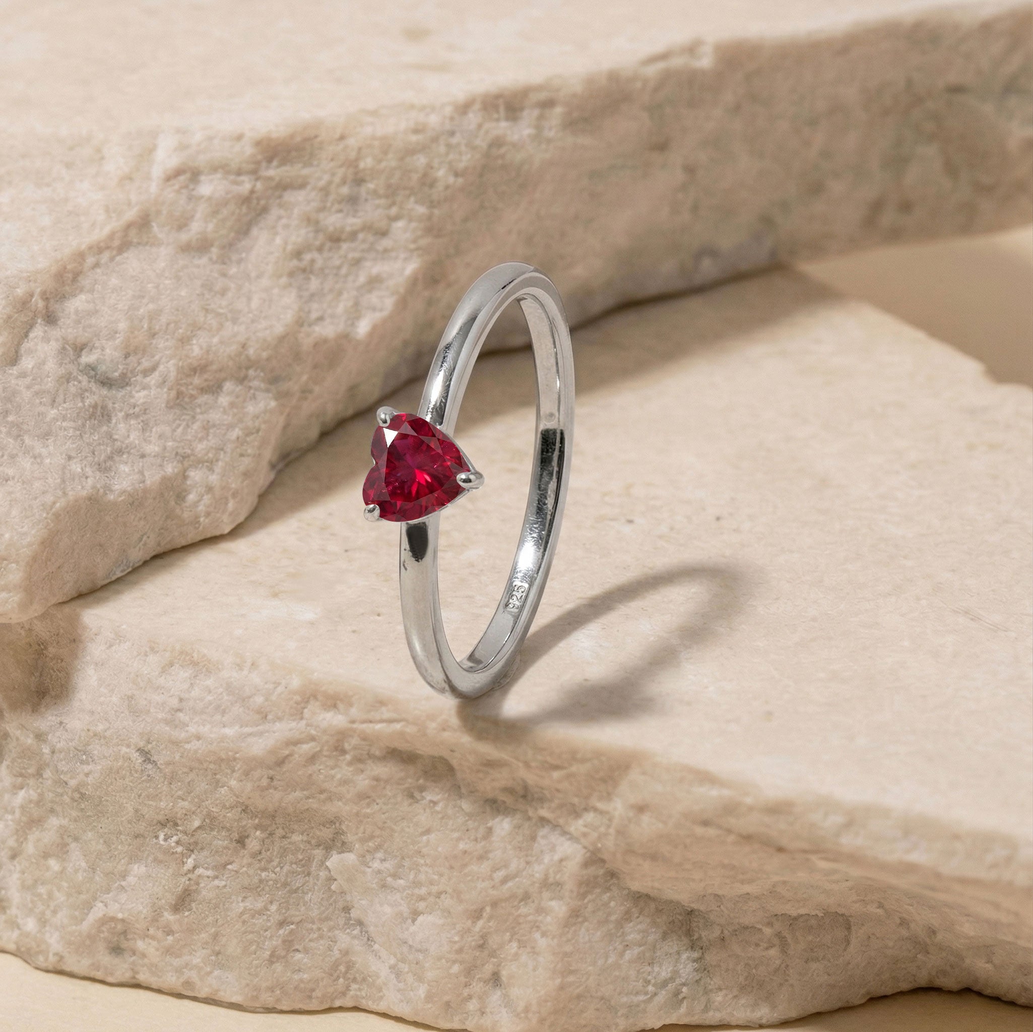 red ruby solitaire jewelry, natural heart gemstone, july birthstone elegance, polished silver ring, yellow gold filled option, romantic fine jewelry, handcrafted gemstone accessory, women's minimalist jewelry, classic ruby fashion, engagement style ring