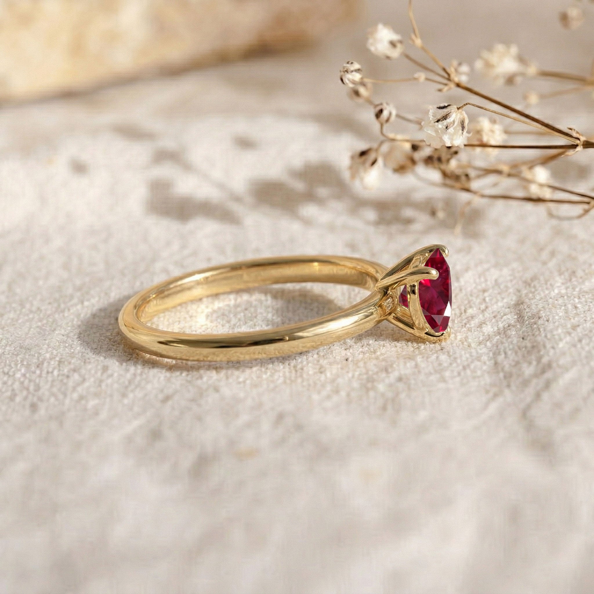 natural ruby statement ring, heart cut red gemstone, solitaire jewelry design, july birthstone fashion, elegant sterling silver ring, fine gemstone jewelry, women's anniversary gift, romantic ruby accessory, timeless jewelry piece, handcrafted elegance