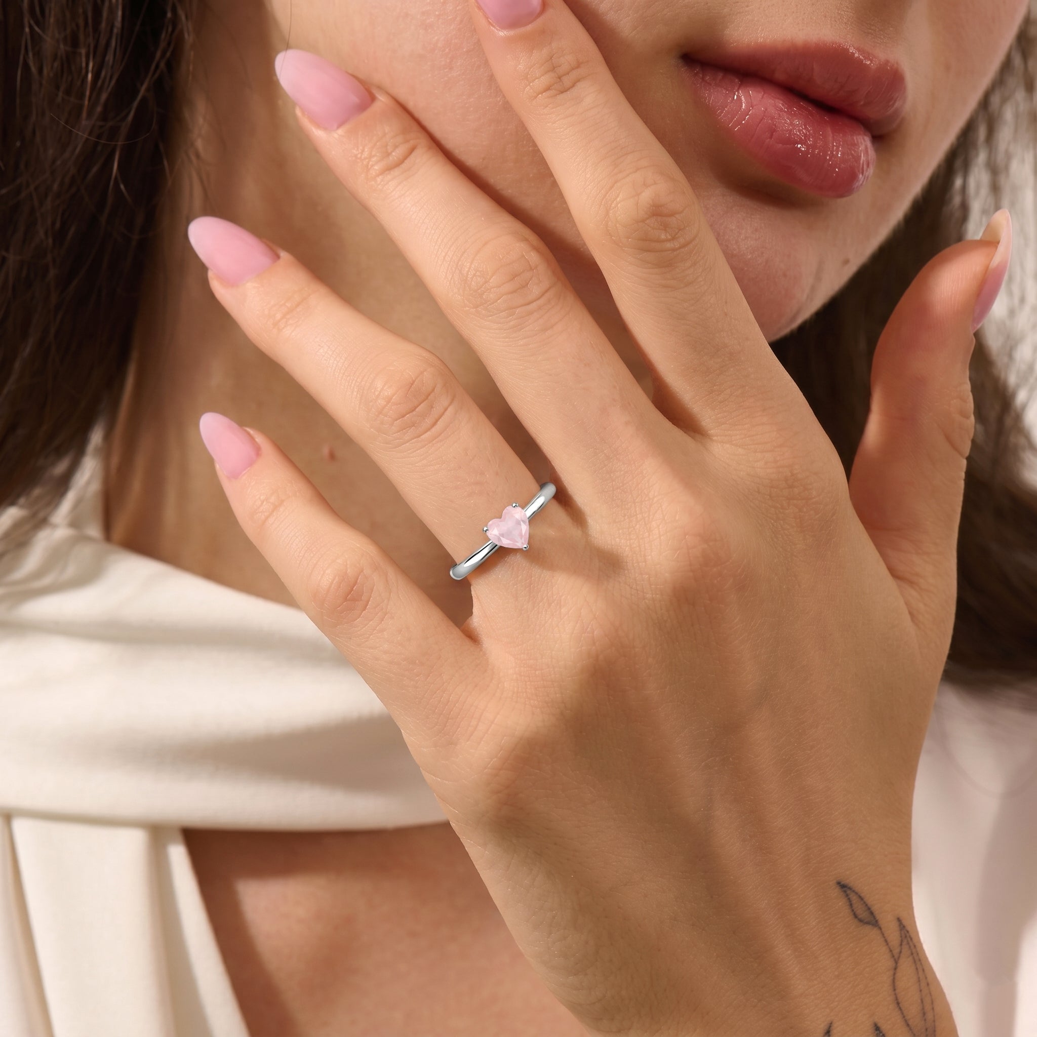 heart shaped rose quartz ring, natural rose quartz jewelry, solitaire gemstone ring, blush pink gemstone jewelry, women's promise ring, minimalist jewelry gift, sterling silver gemstone ring, yellow gold filled jewelry, handcrafted fine jewelry, romantic jewelry gift, dainty heart ring, fashion jewelry, elegant gemstone accessory, timeless jewelry, artisan ring