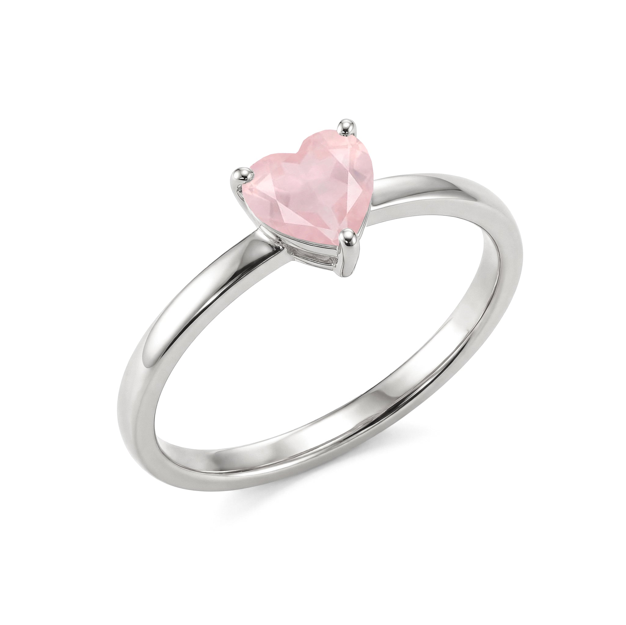 natural rose quartz heart jewelry, handcrafted solitaire ring, elegant gemstone accessory, women's fine jewelry, pink gemstone ring, promise jewelry gift, artisan craftsmanship, anniversary jewelry, timeless fashion accessory, classic jewelry collection, romantic heart gemstone, polished gemstone jewelry, luxury accessory, everyday elegance, handcrafted jewelry