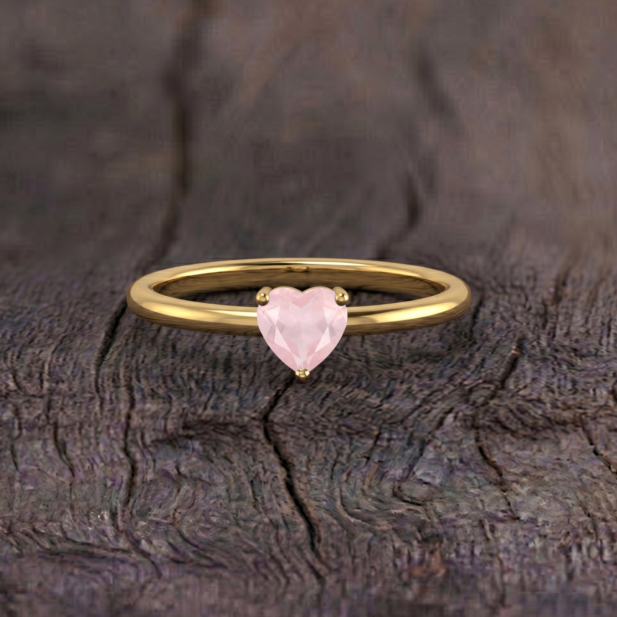 natural rose quartz gemstone ring, pink heart gemstone jewelry, solitaire heart ring, handcrafted gemstone jewelry, anniversary ring gift, birthday present for women, elegant minimalist jewelry, everyday gemstone accessory, artisan jewelry design, fine gemstone ring, women's fashion jewelry, romantic heart jewelry, gemstone gift, luxury jewelry, timeless ring