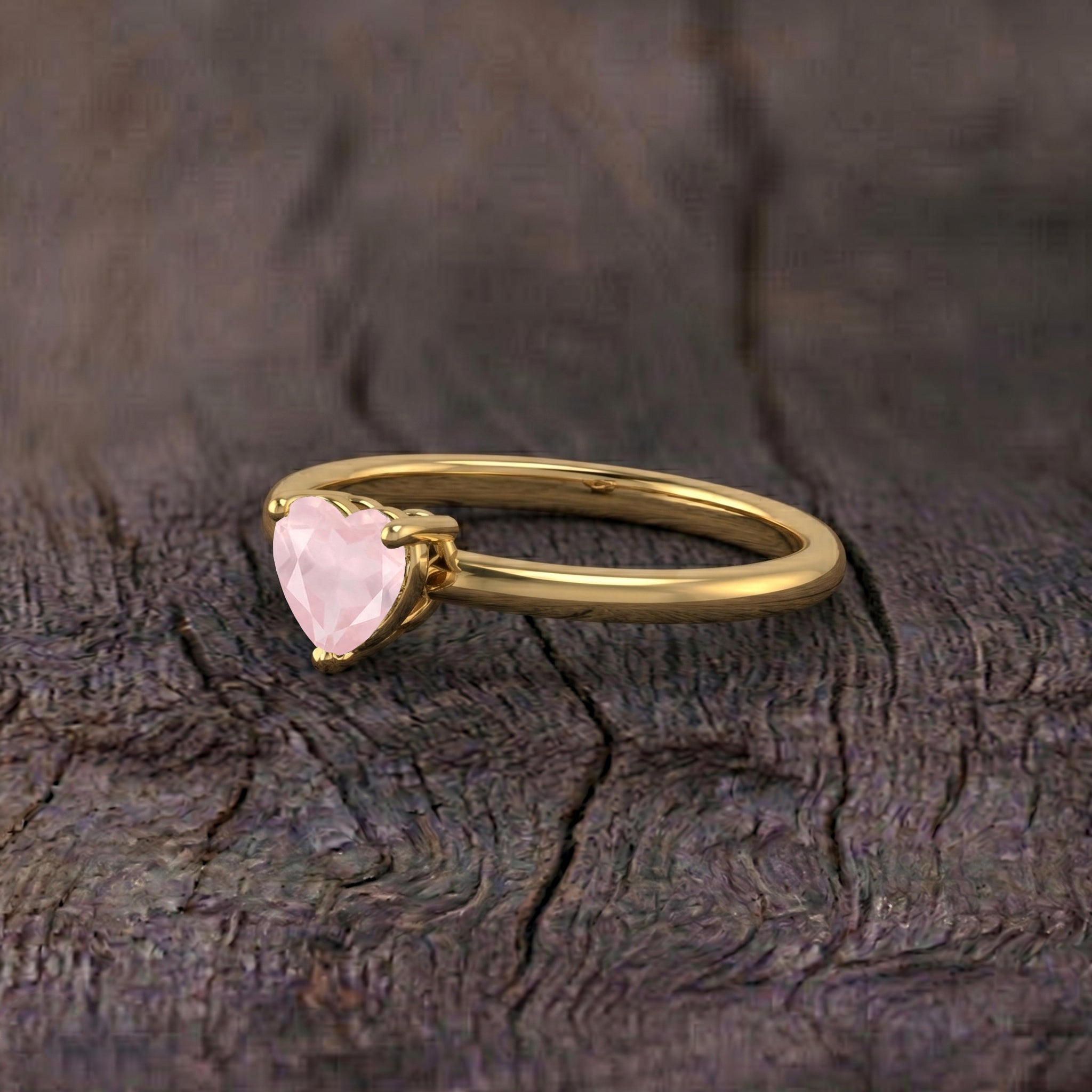 natural pink rose quartz jewelry, heart cut gemstone ring, solitaire jewelry for women, elegant gemstone fashion, handcrafted ring design, timeless jewelry accessory, romantic heart jewelry, luxury minimalist ring, artisan gemstone jewelry, sterling silver jewelry option, yellow gold filled option, birthday jewelry gift, promise ring, everyday elegance, gemstone accessory