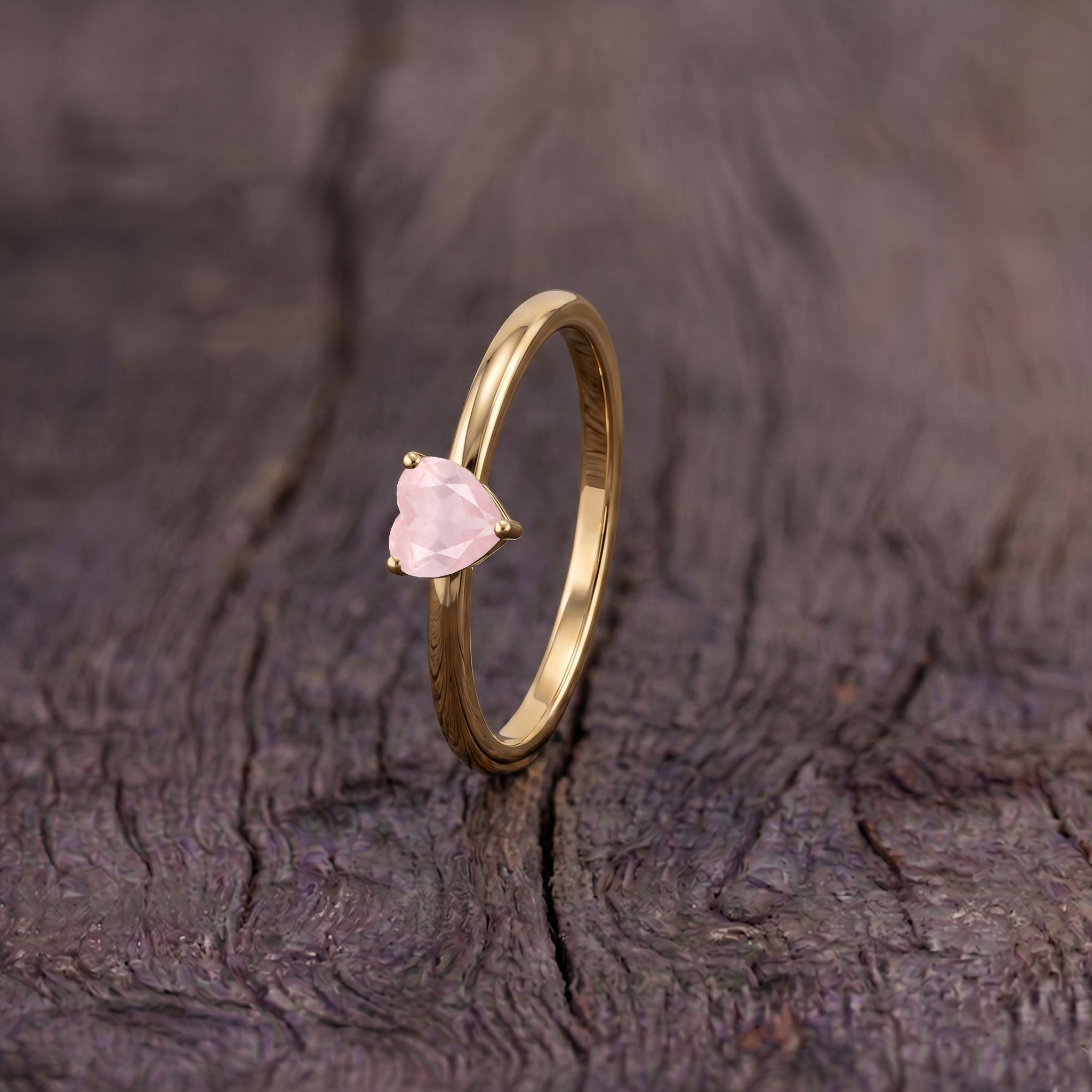 rose quartz heart solitaire jewelry, natural gemstone accessory, handcrafted women's ring, pink gemstone fashion jewelry, artisan gemstone craftsmanship, elegant promise jewelry, anniversary accessory, fine jewelry design, romantic gift for women, timeless heart jewelry, gemstone ring collection, everyday jewelry, minimalist elegance, luxury ring, handcrafted gemstone