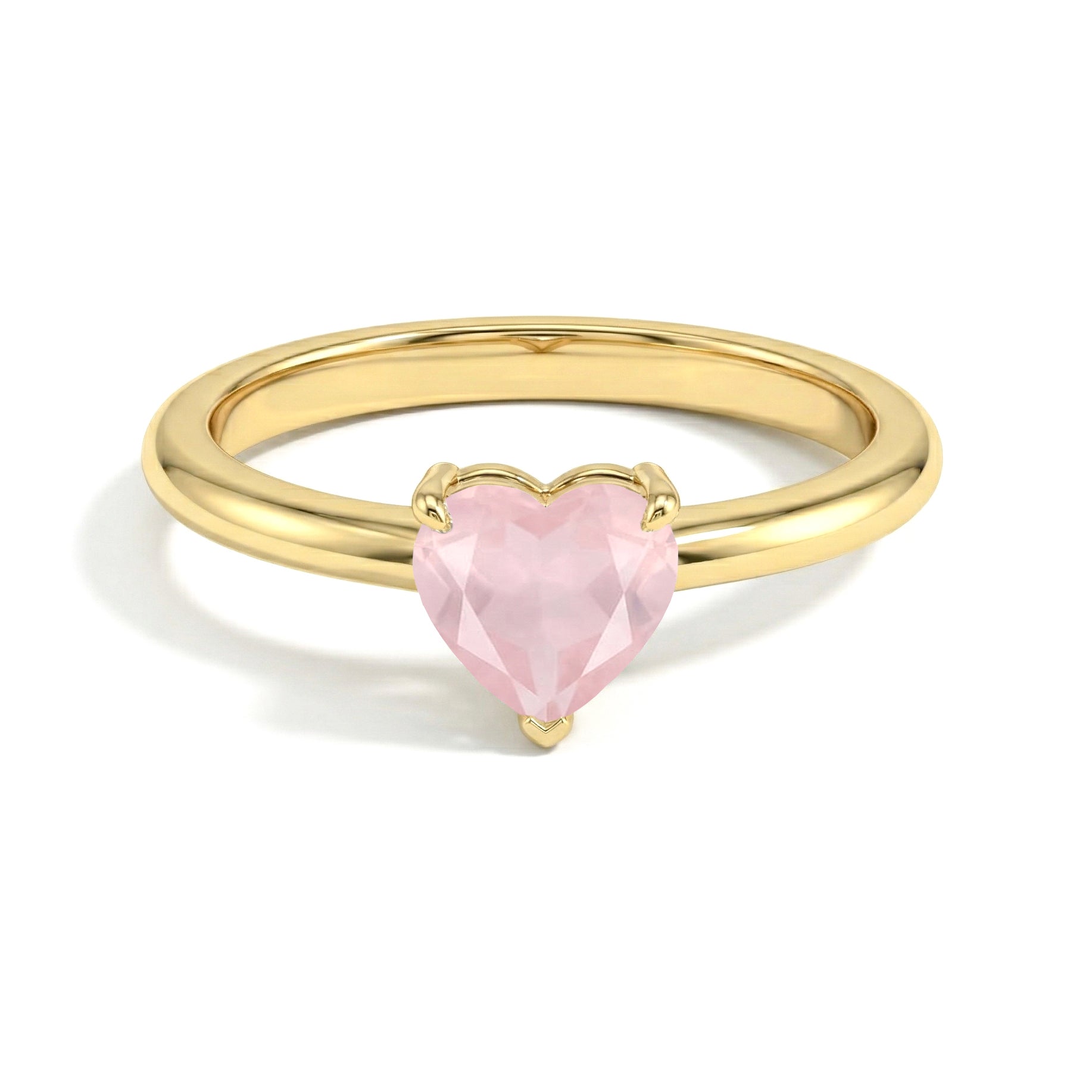 natural rose quartz gemstone jewelry, heart shaped solitaire ring, elegant women's accessory, handcrafted gemstone design, promise ring for her, minimalist jewelry style, artisan gemstone ring, fine jewelry collection, romantic gift idea, timeless elegance, birthday jewelry, anniversary jewelry, polished gemstone, heart jewelry, luxury fashion ring