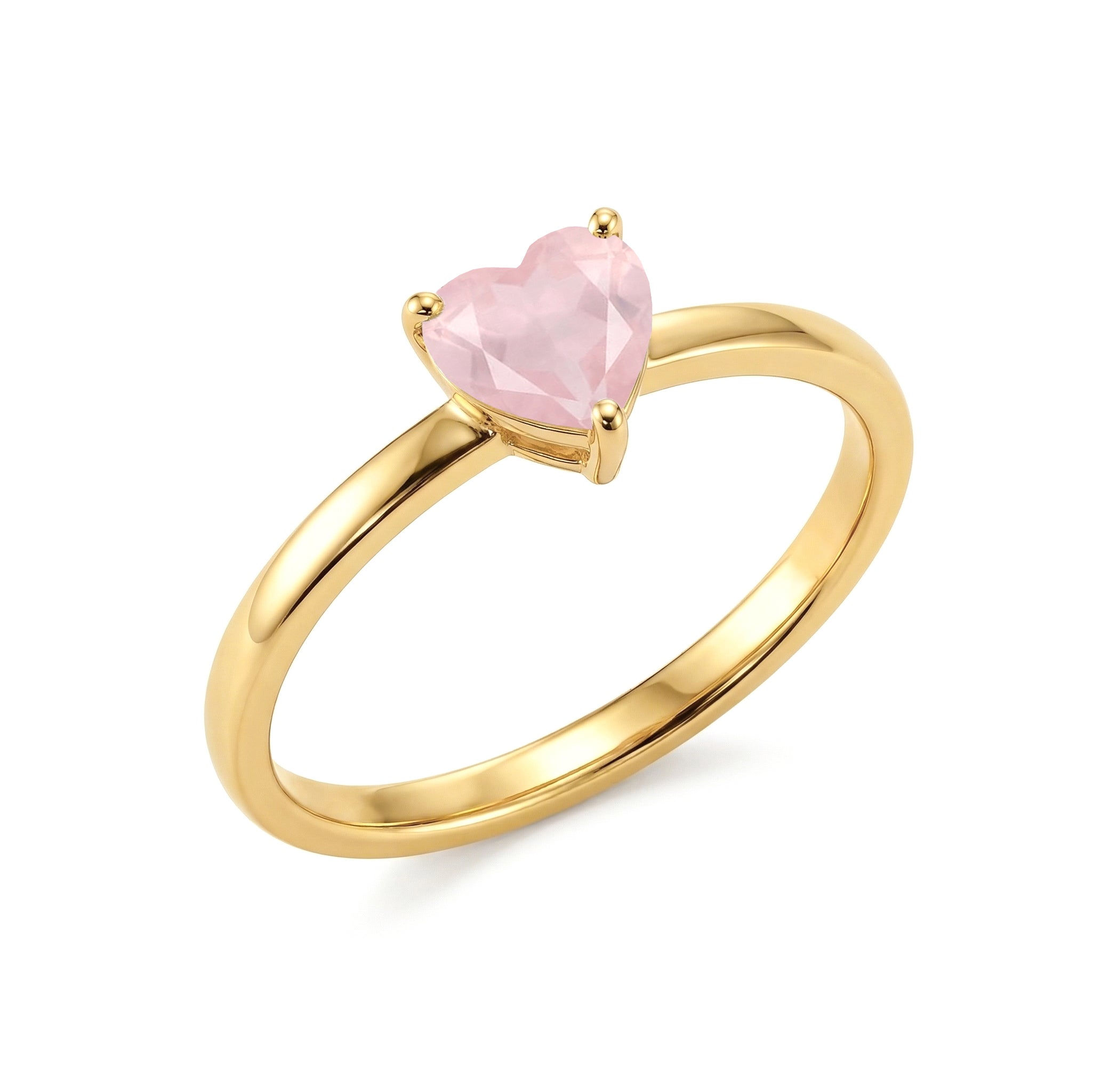 heart cut rose quartz gemstone, natural jewelry ring, elegant solitaire gemstone, artisan jewelry gift, pink gemstone accessory, promise jewelry ring, women's fashion jewelry, handcrafted elegance, everyday luxury jewelry, classic fine jewelry, anniversary present, romantic gemstone design, minimalist jewelry, timeless accessory, gemstone craftsmanship