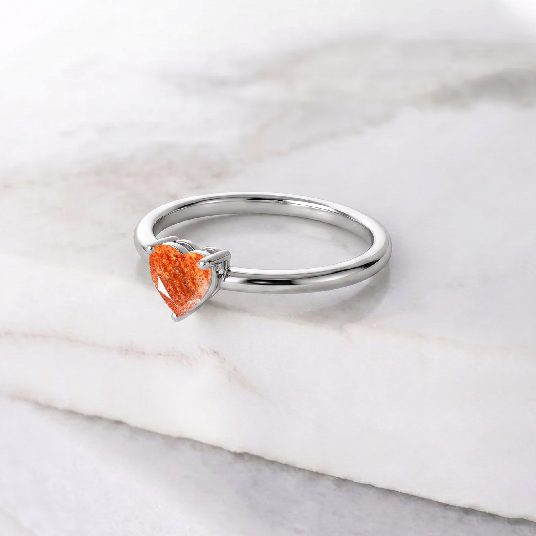 heart solitaire gemstone jewelry, natural sunstone ring, handcrafted premium accessory, women's jewelry fashion, elegant gemstone design, artisan craftsmanship, romantic keepsake, fine jewelry collection, polished gemstone, timeless accessory, luxury fashion, birthday jewelry, anniversary ring, statement jewelry, gemstone elegance