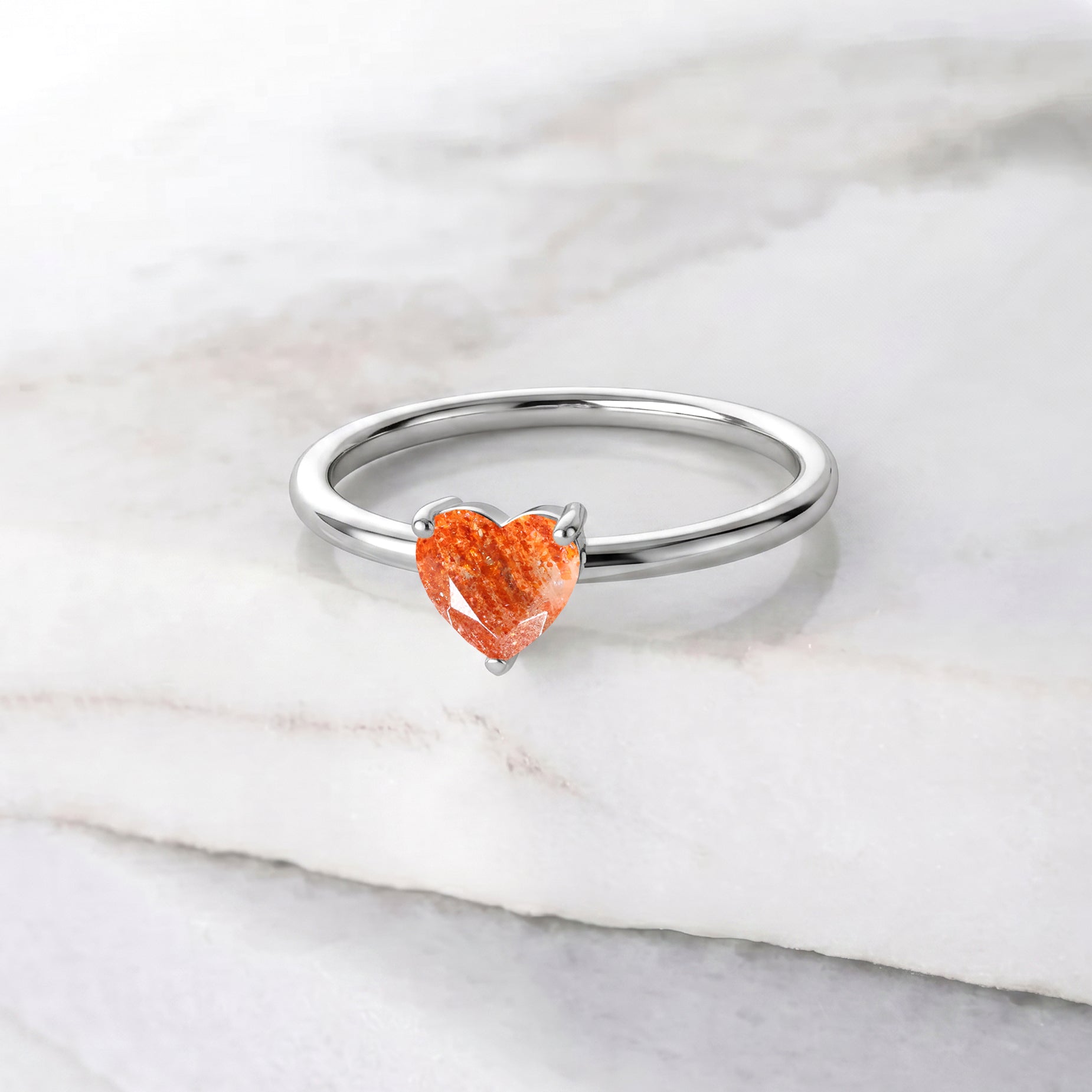 heart gemstone jewelry, natural sunstone accessory, elegant handcrafted ring, women's fashion jewelry, polished gemstone ring, artisan design, premium jewelry collection, birthday gift, anniversary keepsake, promise jewelry, fine jewelry style, timeless fashion, refined accessory, modern jewelry, gemstone beauty