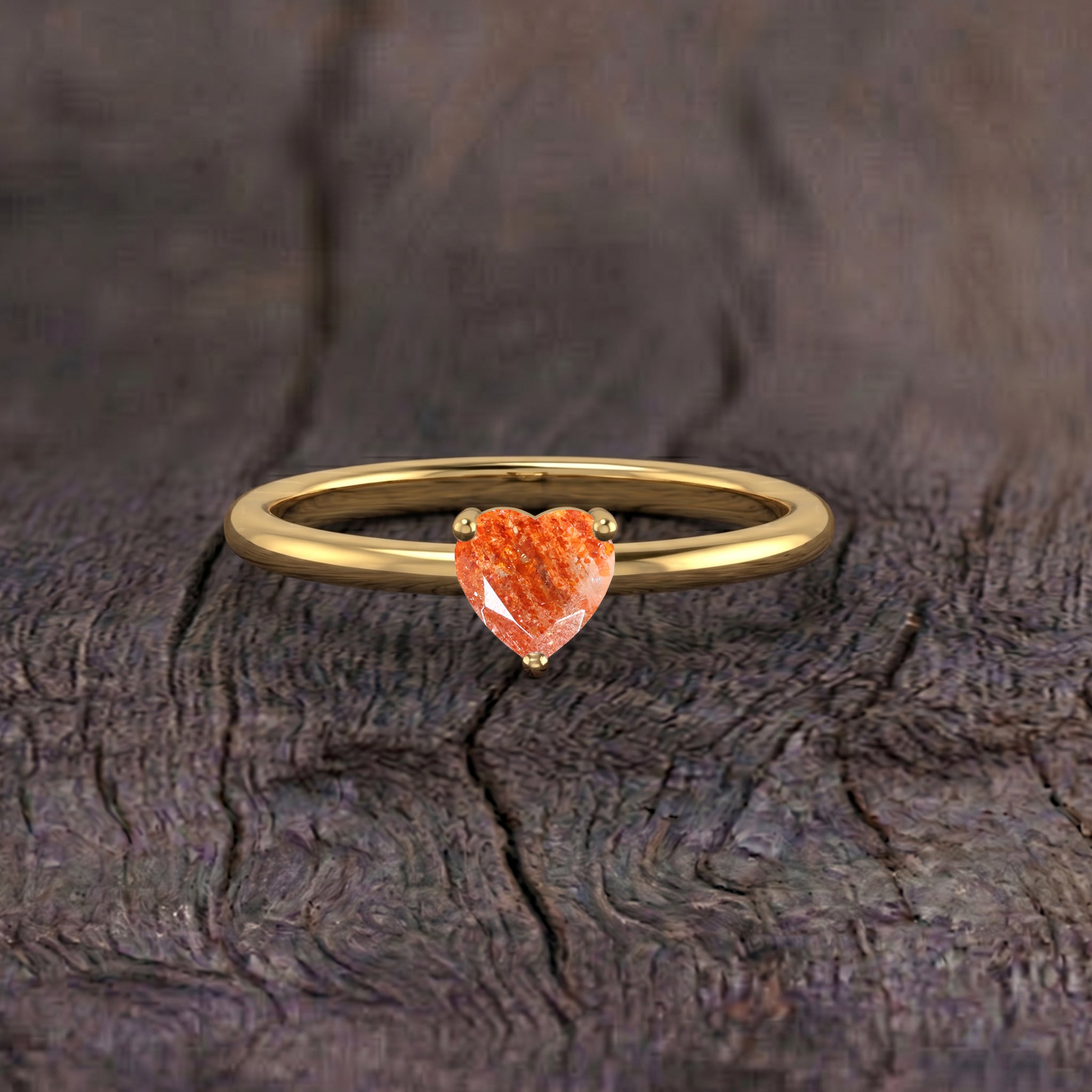 natural sunstone solitaire ring, heart jewelry design, handcrafted gemstone accessory, women's jewelry collection, elegant fashion ring, anniversary jewelry gift, meaningful keepsake, polished gemstone, refined jewelry, artisan craftsmanship, luxury accessory, everyday wear, gemstone elegance, timeless ring, stylish jewelry