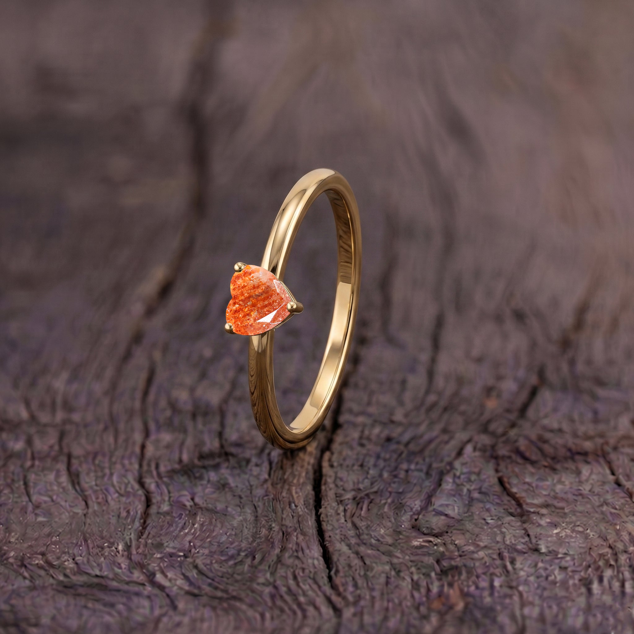 sunstone gemstone accessory, heart jewelry collection, elegant women's ring, handcrafted fashion jewelry, artisan luxury ring, premium gemstone craftsmanship, everyday jewelry style, promise jewelry idea, timeless elegance, polished finish, sophisticated accessory, jewelry gift, classic design, feminine ring, fine jewelry