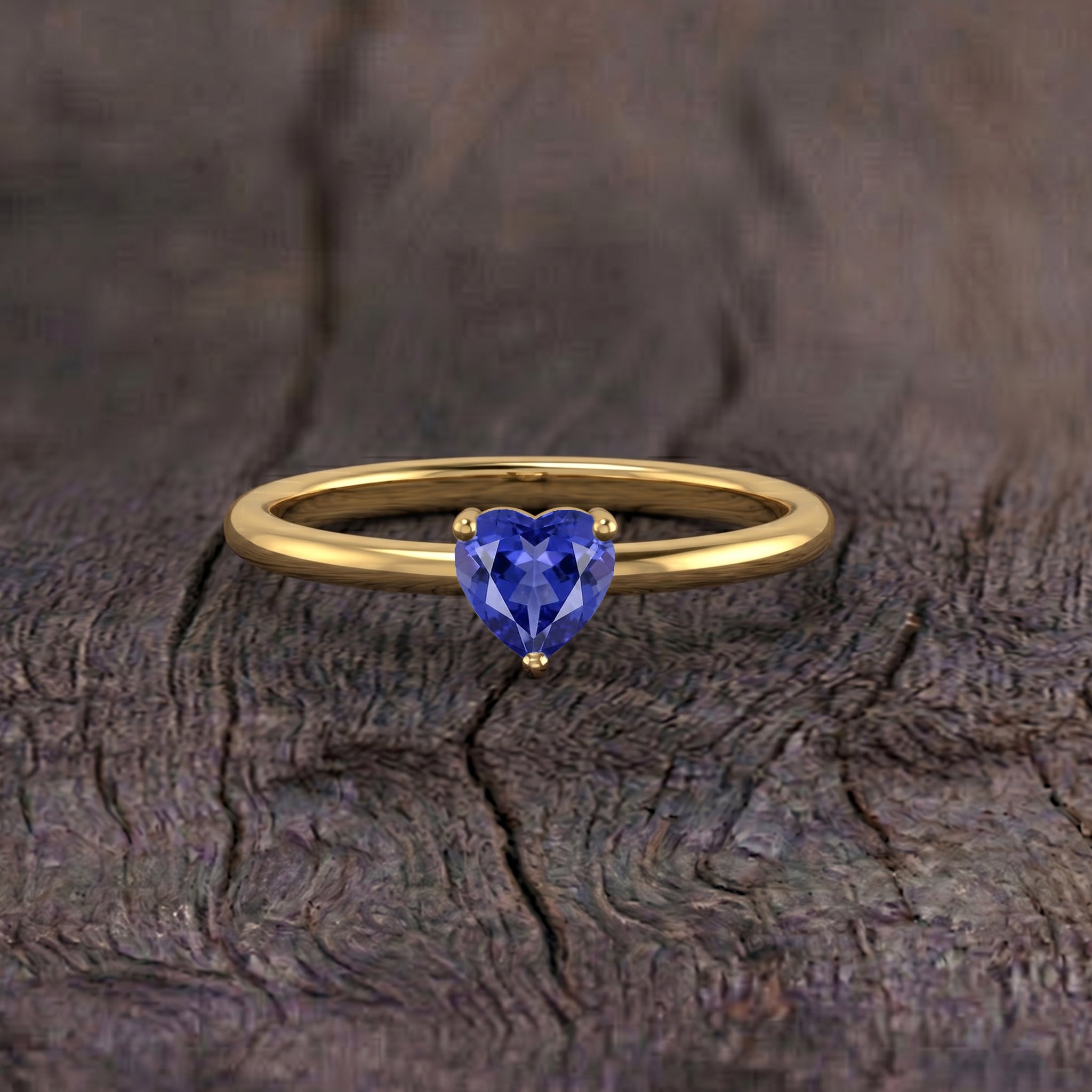 lab tanzanite gemstone ring, elegant heart solitaire, handcrafted jewelry, gemstone centerpiece, women's jewelry accessory, december birthstone gift, sophisticated ring design, fine jewelry collection, anniversary jewelry, birthday gift, minimalist elegance, timeless fashion, polished craftsmanship, gemstone ring, romantic jewelry