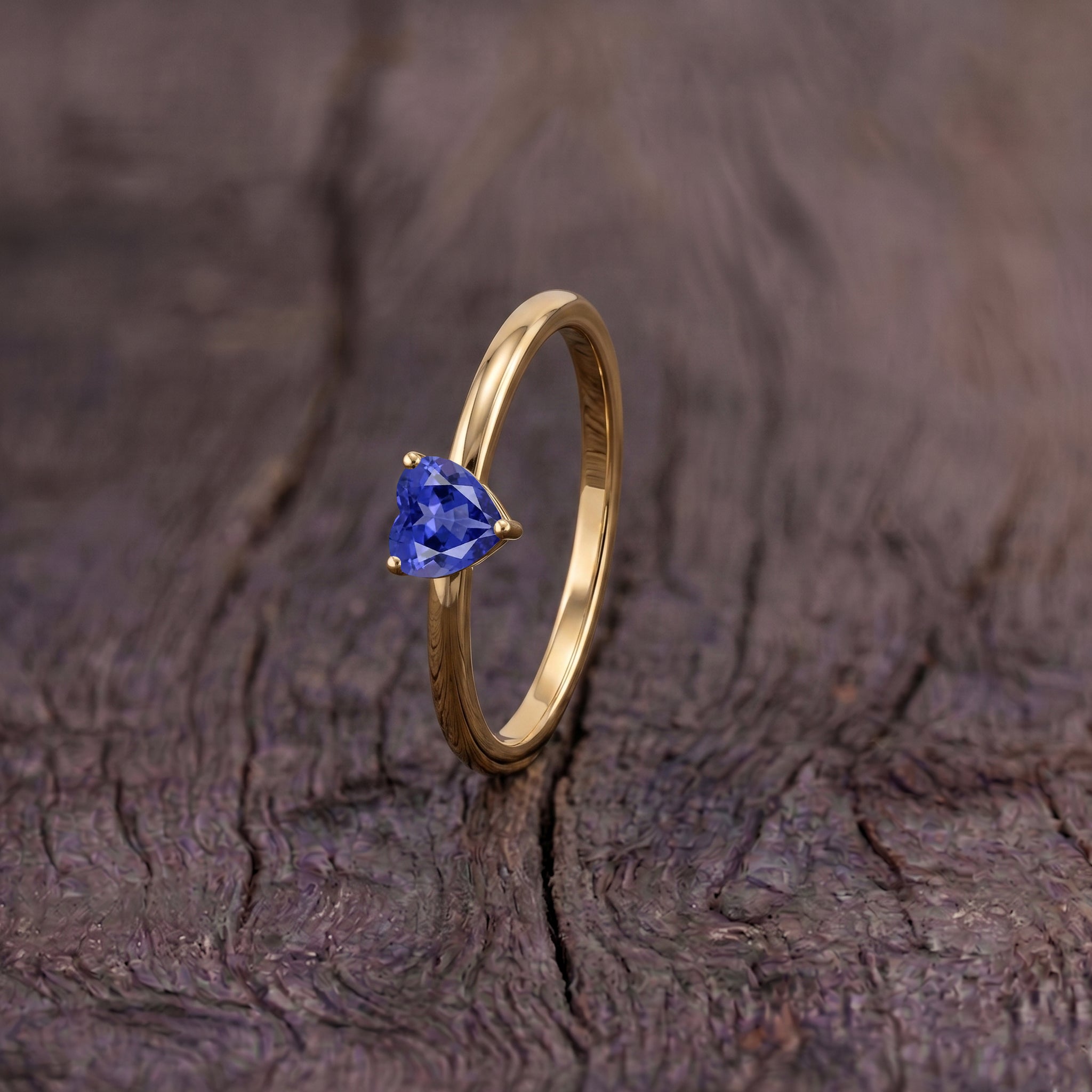 lab tanzanite heart solitaire, elegant gemstone ring, handcrafted jewelry design, women's classic accessory, gemstone anniversary gift, birthday keepsake, fine jewelry craftsmanship, timeless solitaire, artisan ring design, sophisticated elegance, polished gemstone, romantic heart jewelry, minimalist accessory, premium jewelry, gemstone ring