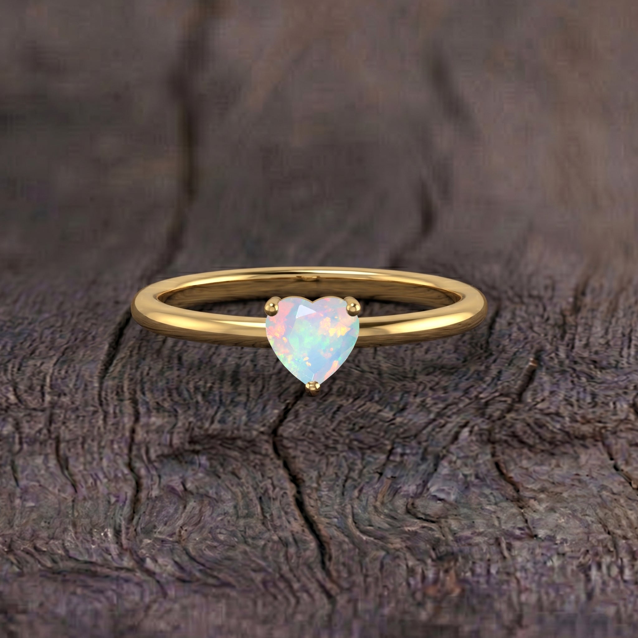 natural white opal solitaire ring, heart shaped gemstone, october birthstone gift, simple elegant jewelry, bridal accessory, engagement style ring, everyday fashion jewelry, handcrafted gemstone ring, women's fine jewelry, romantic gift, minimalist design, polished finish, lightweight ring, delicate style, classic jewelry
