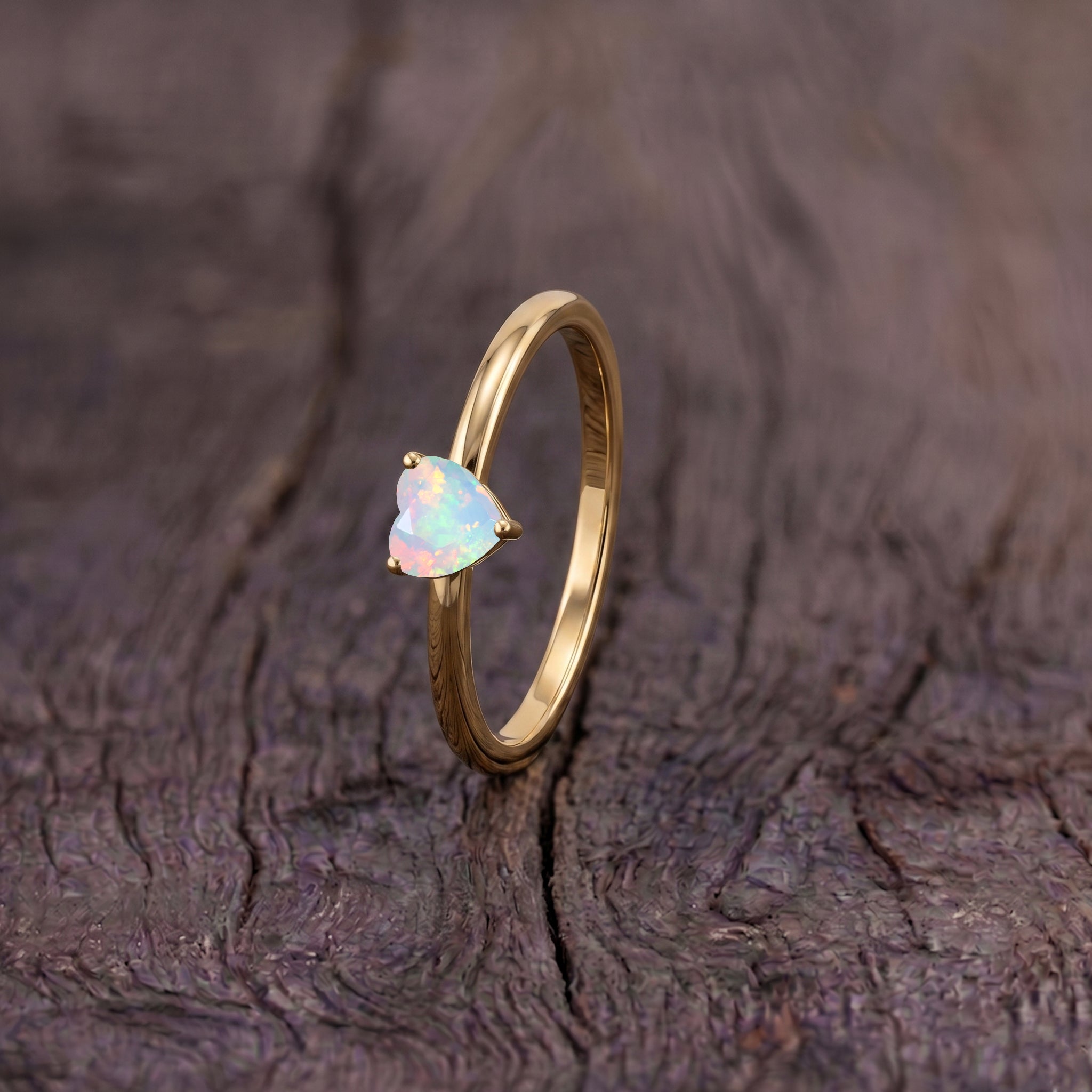 white gemstone solitaire ring, natural opal jewelry, october birthstone accessory, elegant women's gift, fine handcrafted ring, polished heart gemstone, anniversary keepsake, birthday jewelry, bridal ring style, minimalist fashion accessory, timeless design, artisan craftsmanship, delicate elegance, gemstone lover gift, luxury jewelry
