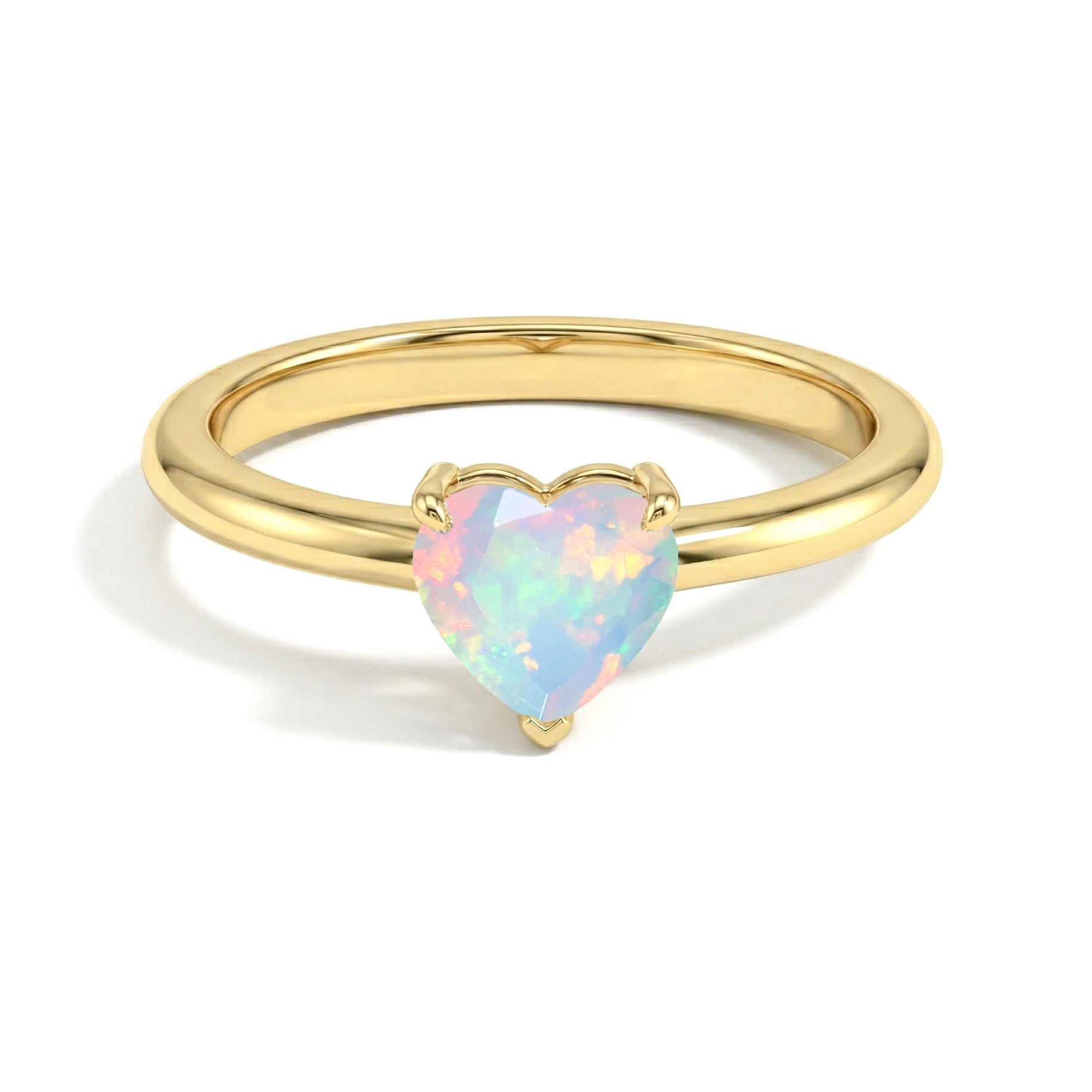 elegant white opal heart gemstone, solitaire jewelry ring, october birthstone accessory, women's fine jewelry, handcrafted gemstone design, polished artisan ring, anniversary jewelry gift, romantic promise ring, birthday keepsake, bridal accessory, minimalist fashion, timeless jewelry style, delicate elegance, gemstone lover, classic ring