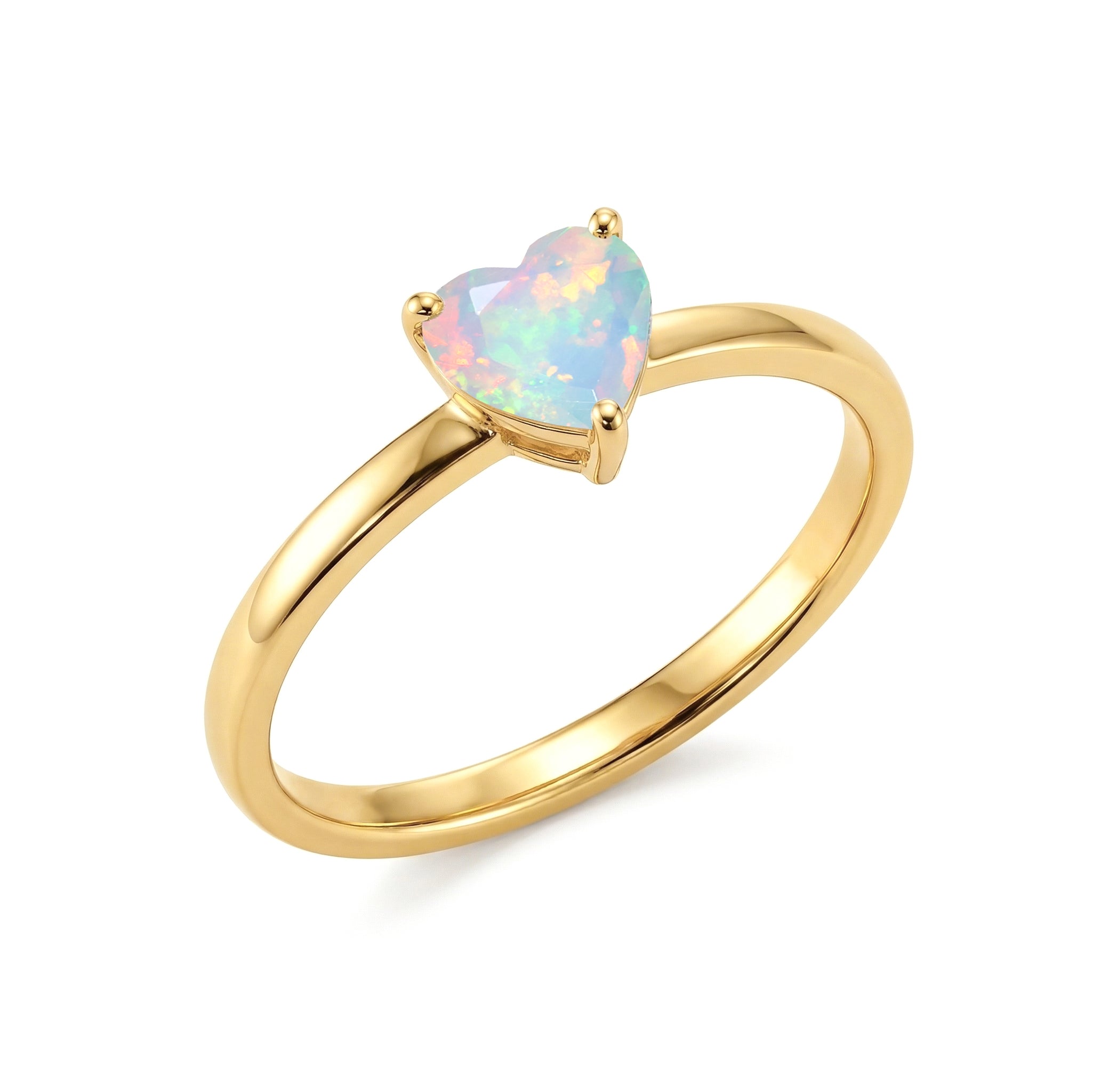october birthstone heart jewelry, natural opal solitaire, women's elegant ring, handcrafted gemstone accessory, polished jewelry design, minimalist heart ring, bridal jewelry inspiration, anniversary ring, birthday present, gemstone collector jewelry, artisan crafted ring, delicate elegance, classic solitaire, refined jewelry, romantic gift