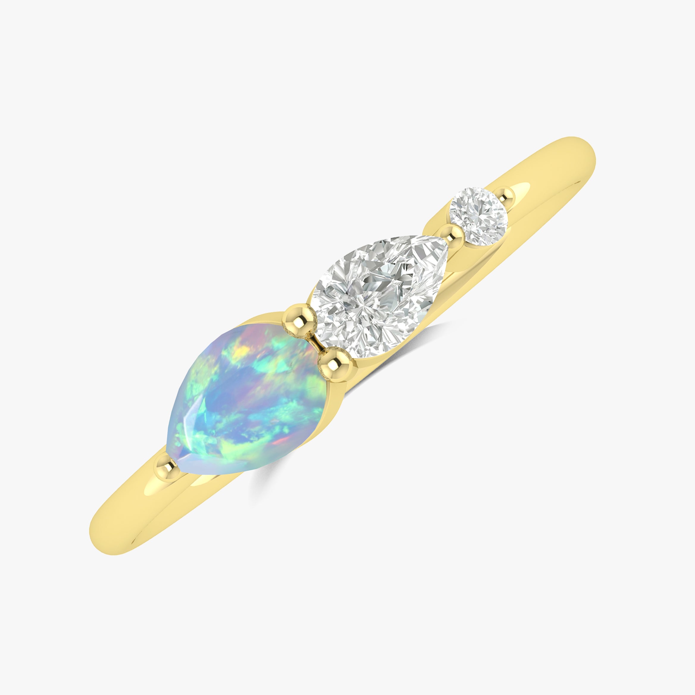 White Fire Opal Pear Three Stone Ring