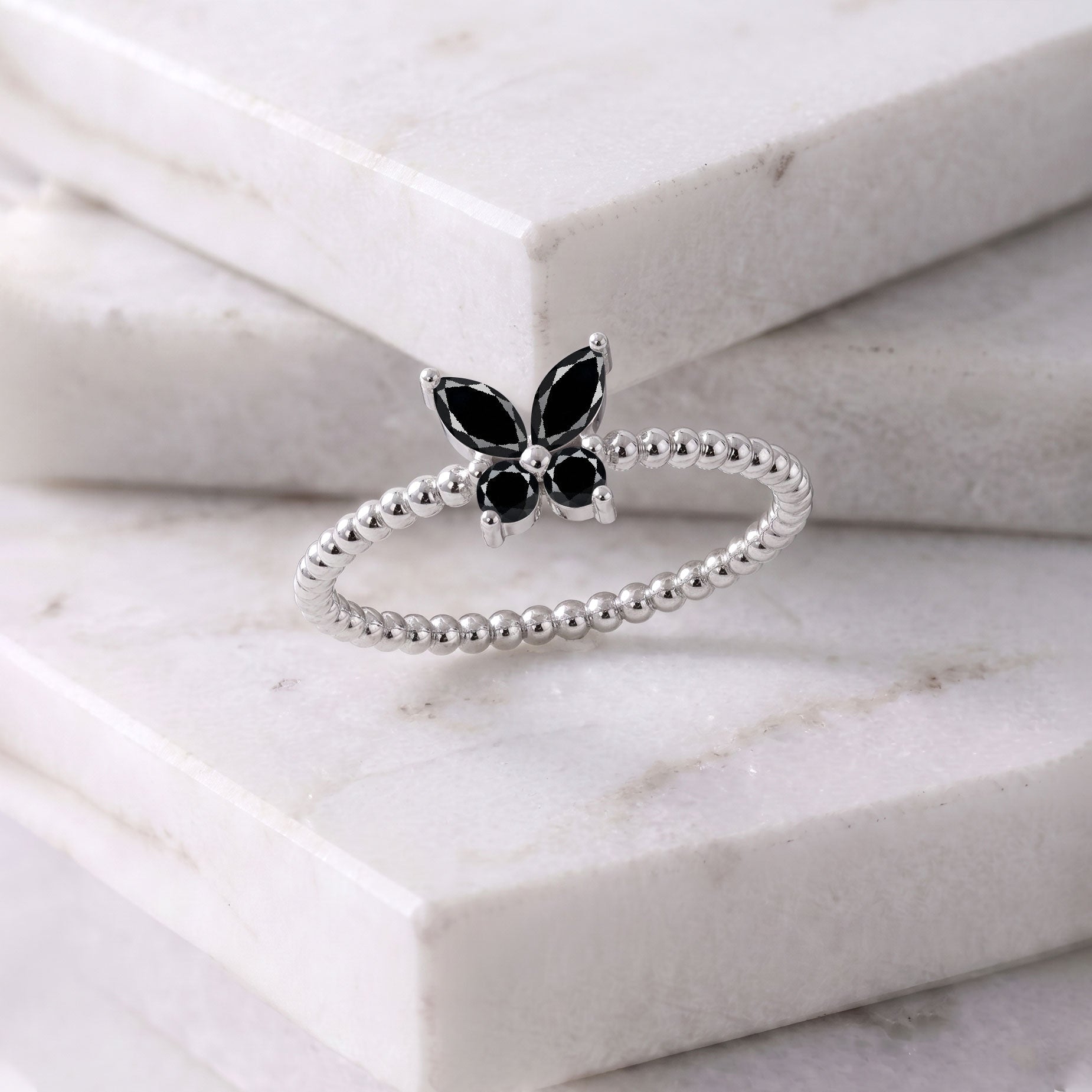 Elegant black onyx butterfly jewelry featuring a sculptural butterfly ring design, sophisticated gemstone centerpiece, and refined finish for timeless everyday styling
