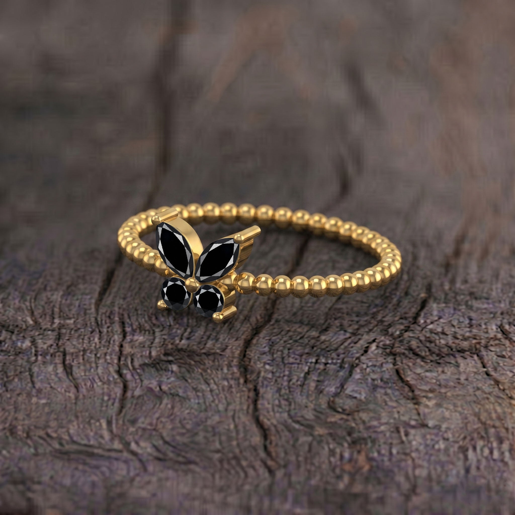 Yellow gold filled black onyx butterfly ring featuring an elegant sculptural butterfly design and striking gemstone centerpiece, unique statement jewelry for women