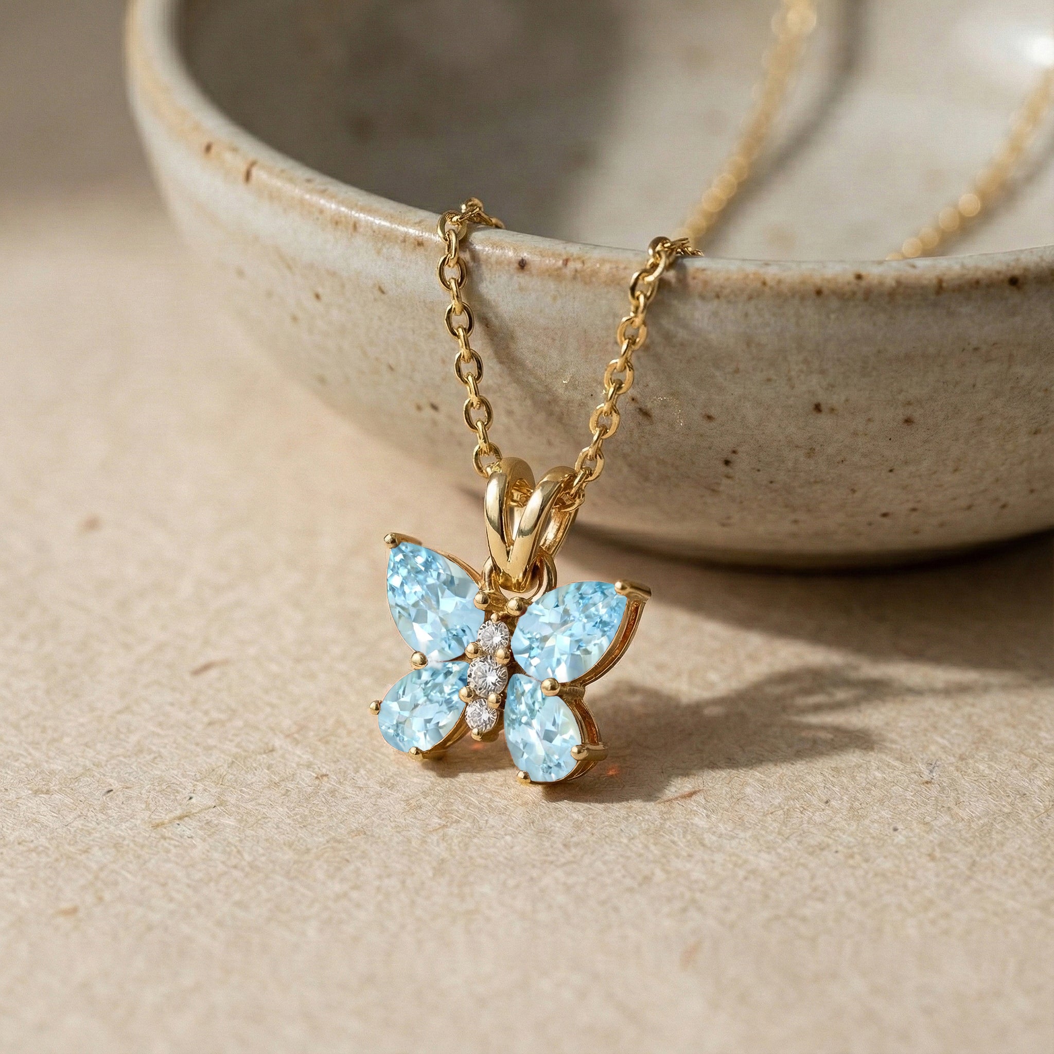 Aquamarine Pear Butterfly Pendant Necklace in Yellow Gold Plated 2ct