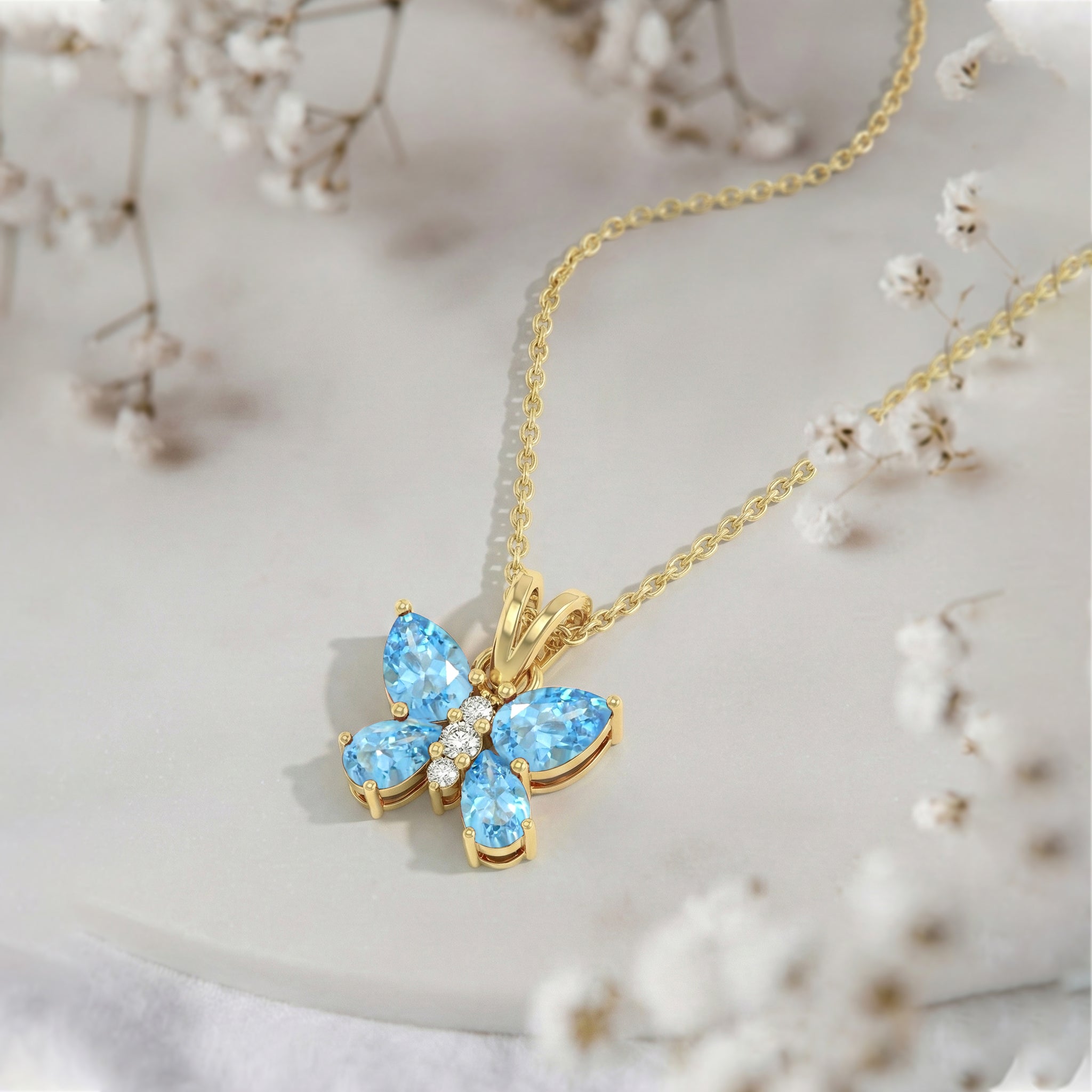 Blue Topaz Pear Butterfly Pendant Necklace in Yellow Gold Plated 2ct