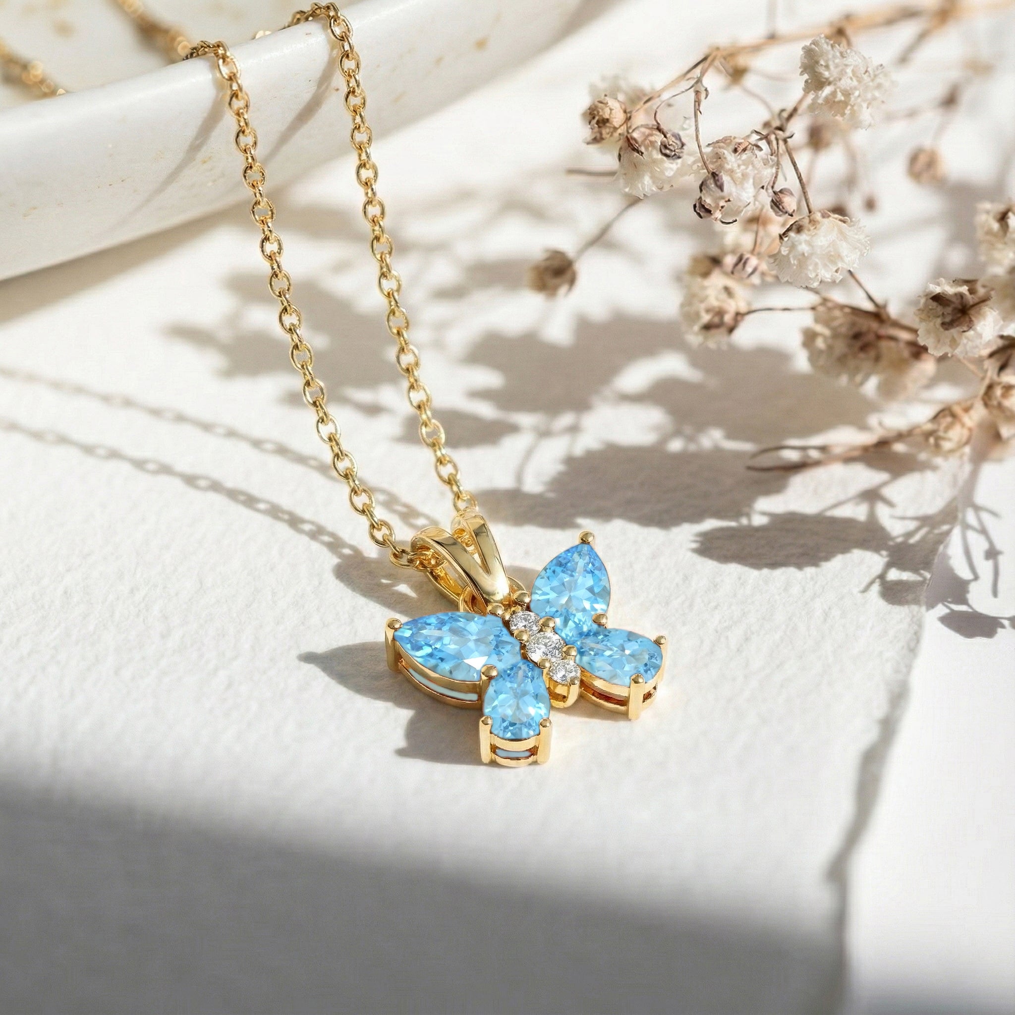 Blue Topaz Pear Butterfly Pendant Necklace in Yellow Gold Plated 2ct