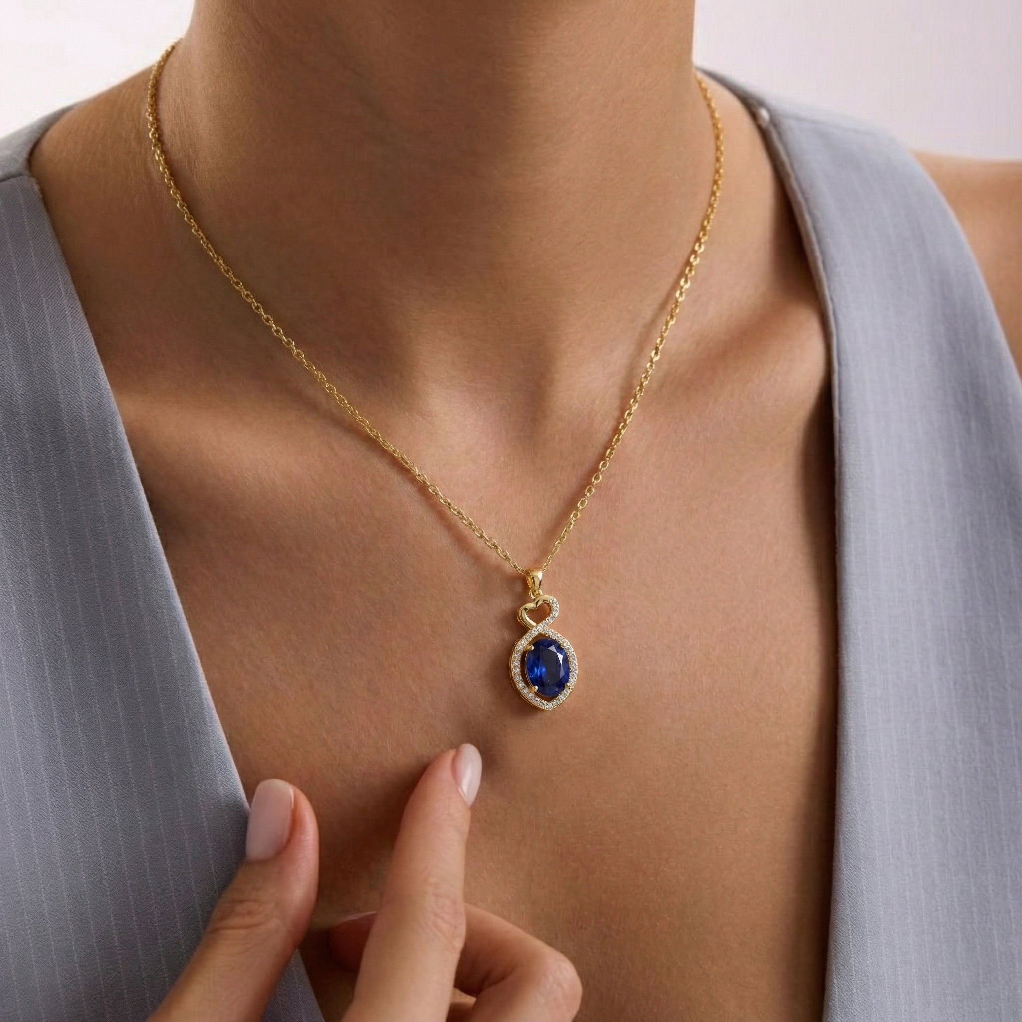 Blue Sapphire Oval Infinity Twist Heart Pendant Necklace in Yellow Gold Plated 1.2ct