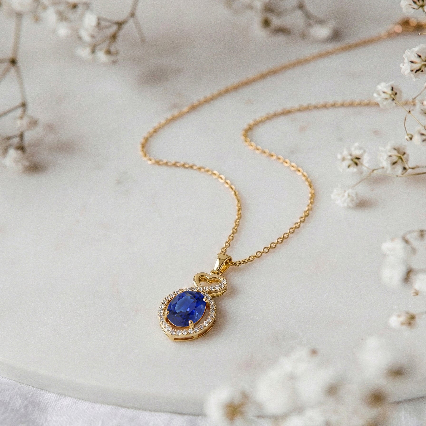 Blue Sapphire Oval Infinity Twist Heart Pendant Necklace in Yellow Gold Plated 1.2ct