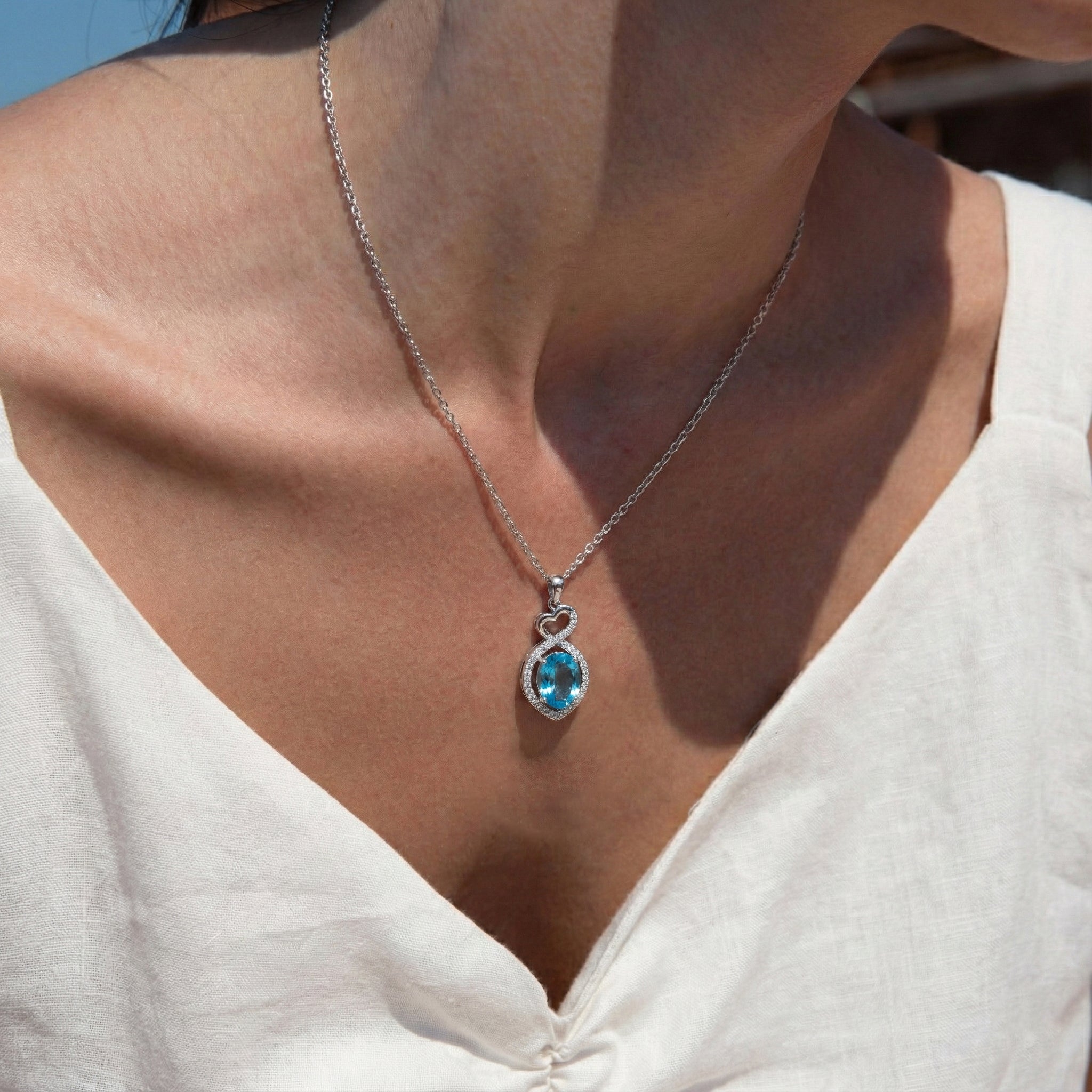 Natural Blue Topaz Oval Infinity Twist Heart Pendant Necklace in 925 Sterling Silver 1.2ct