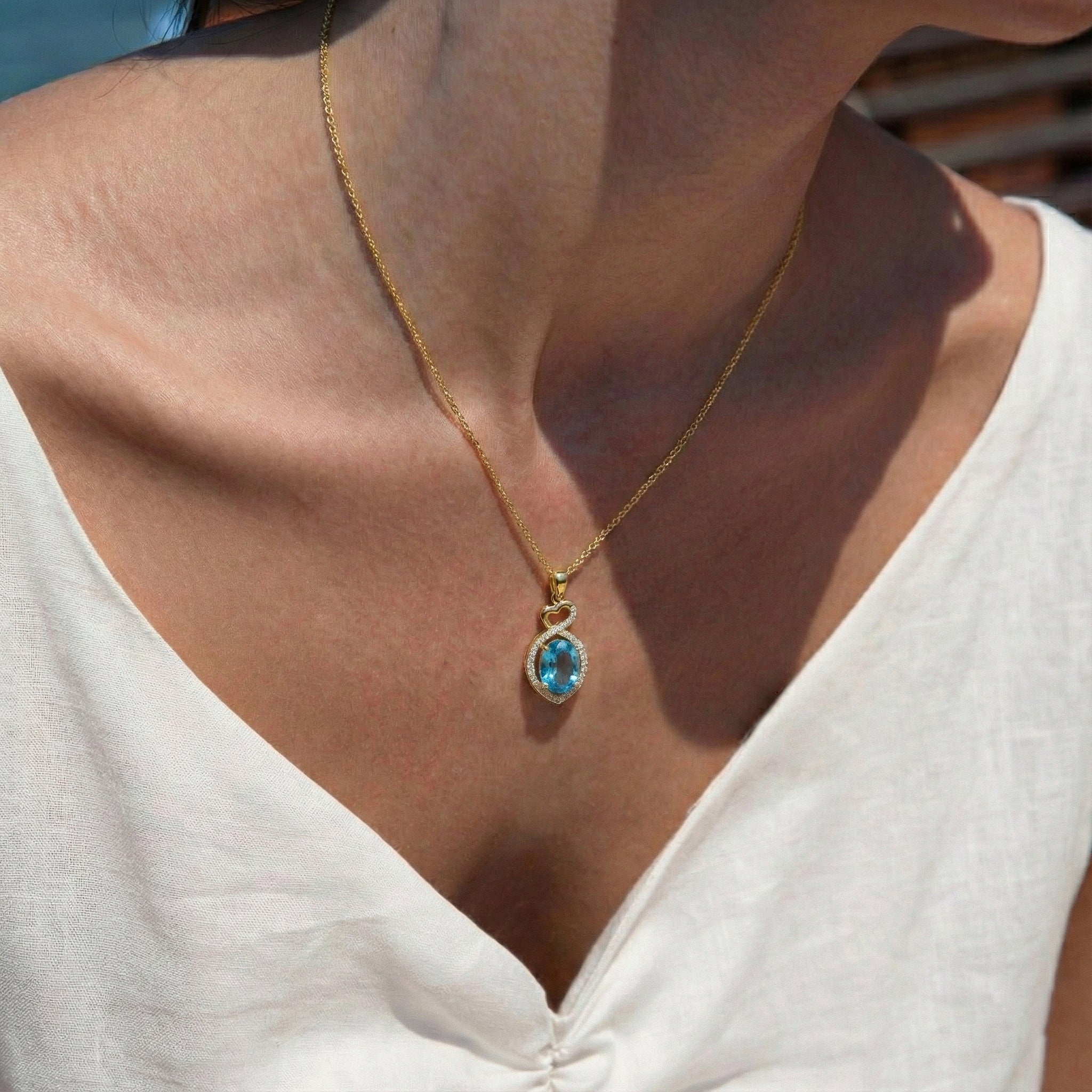 Natural Blue Topaz Oval Infinity Twist Heart Pendant Necklace in 925 Sterling Silver 1.2ct