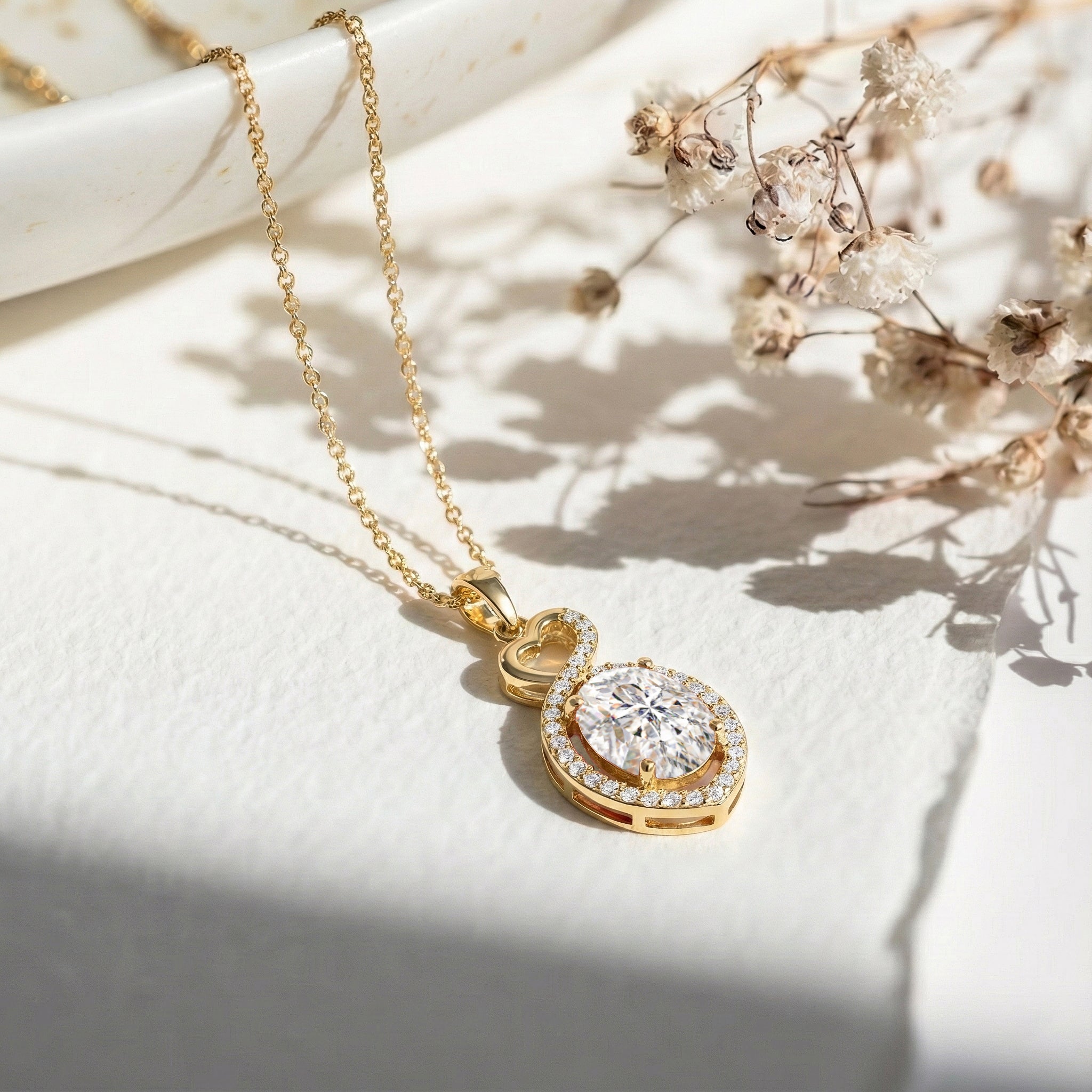 Simulated Diamond Oval Infinity Twist Heart Pendant Necklace in Yellow Gold Plated 1.2ct