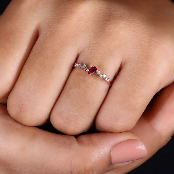 Genuine Red Rose Ruby with a small round Cubic Zircon ring