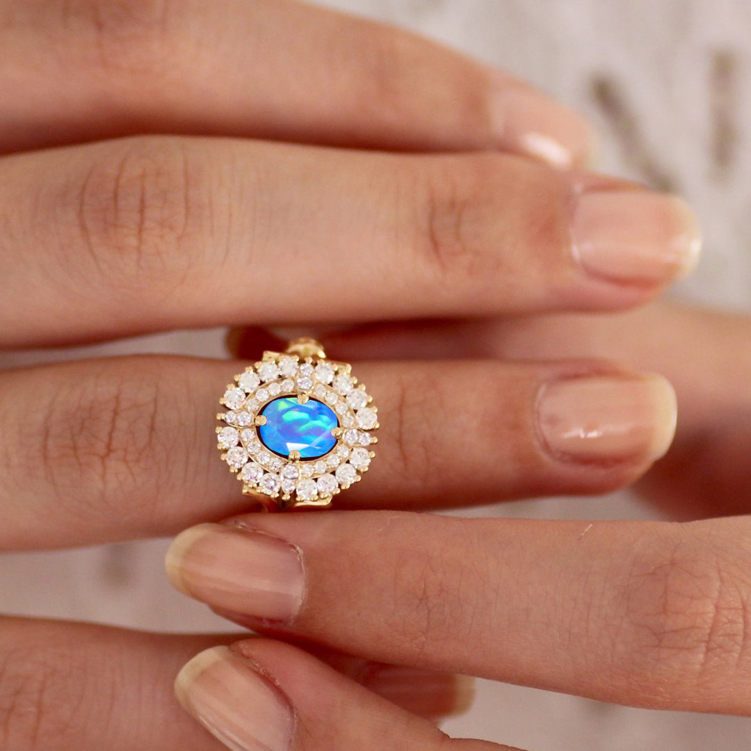 Beautiful blue fire Opal with small Cubic Zirconia Engagement ring