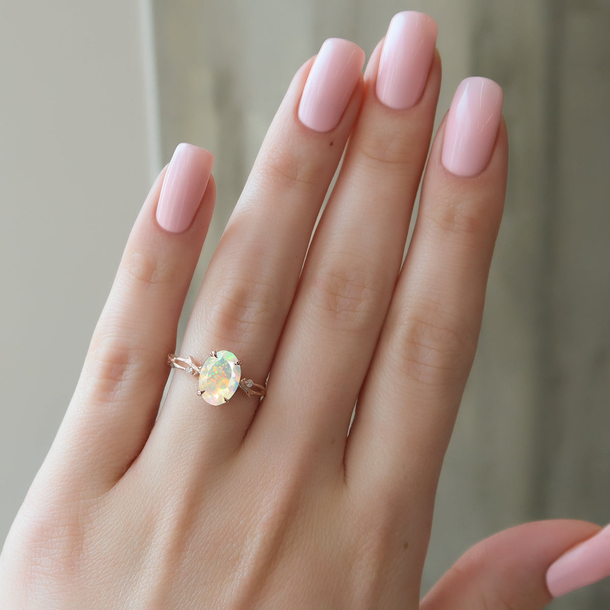 Natural White Opal with Side Stone Crossover Solitaire Ring