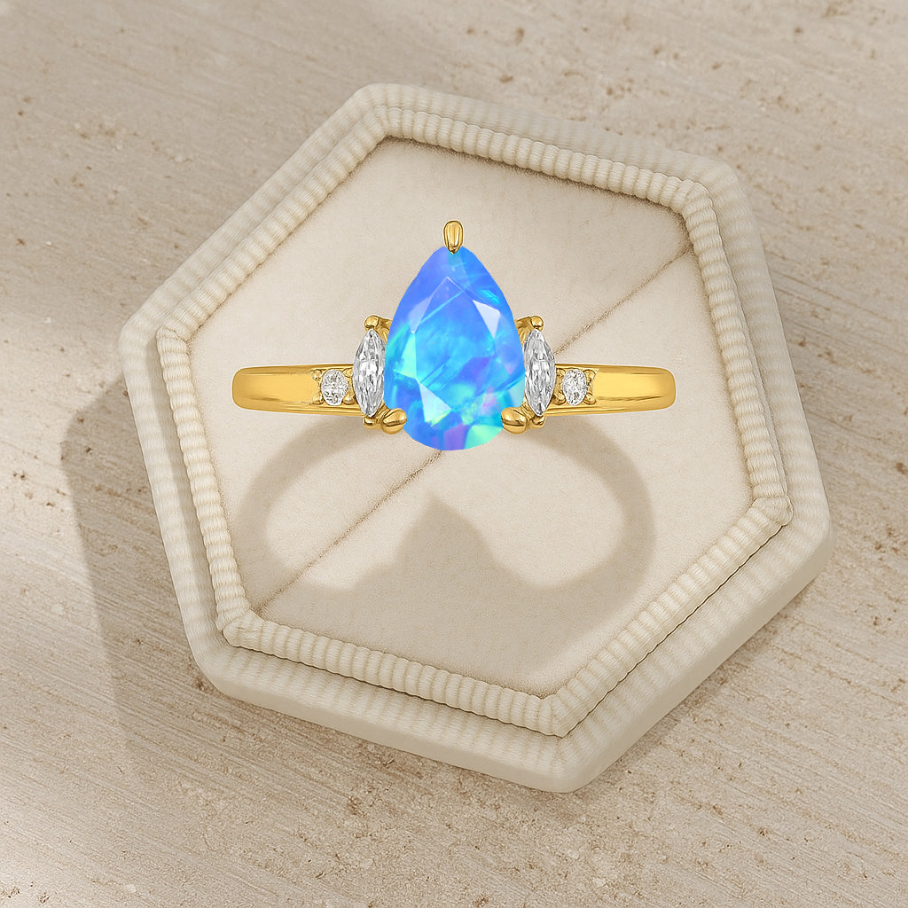 Pear Shape Fire Blue Opal Solitaire Ring with Cubic Zironia