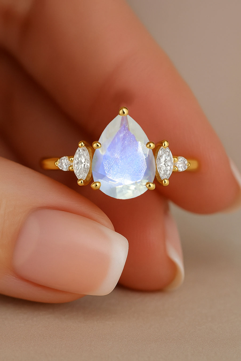 Pear Shape Rainbow Moonstone Solitaire Ring with Cubic Zironia