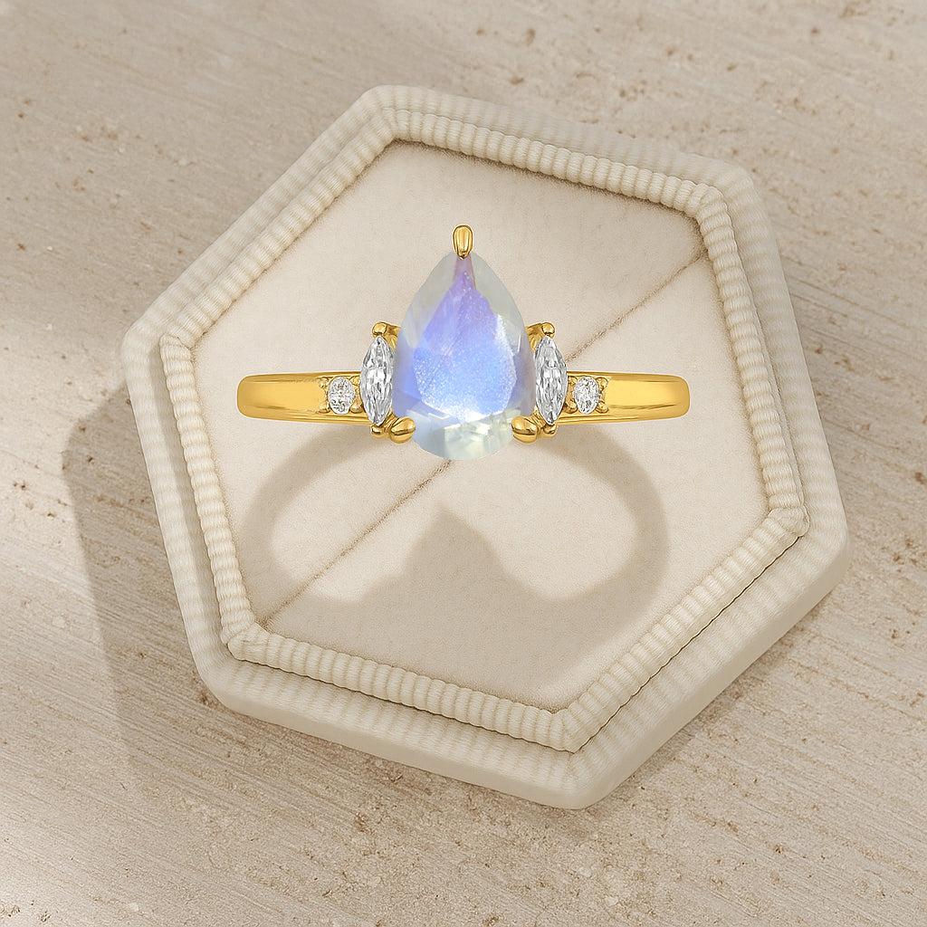 Pear Shape Rainbow Moonstone Solitaire Ring with Cubic Zironia
